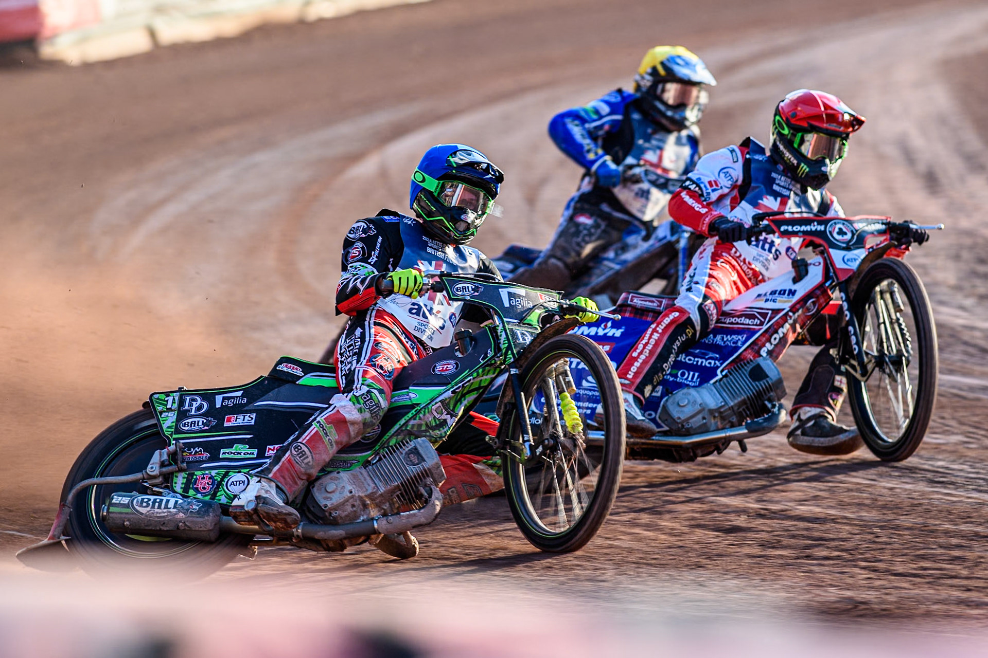 Charles Wright in Blue rides outside Dan Bewley in Red and Chris Harris in Yellow during the Attis Insurance Sports Division British Speedway Championship Final at the National Speedway Stadium, Manchester on Saturday 8th June 2024. (Photo: Ian Charles | MI News)