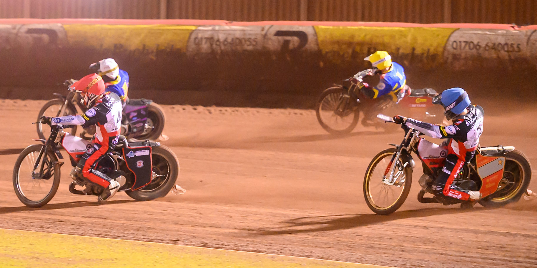 Zach Cook of Belle Vue Aces in Red on the inside of Josh Pickering of Sheffield Tigers in White with Norick Blodorn of Belle Vue Aces in Blue  and Max Fricke, Guest Rider for Sheffield Tigers  in Yellow  behind during the Rowe Motor Oil Premiership Grand Final 2nd Leg between Belle Vue Aces and Sheffield Tigers at the National Speedway Stadium, Manchester on Friday 16th October 2026. (Photo: Ian Charles | MI News)