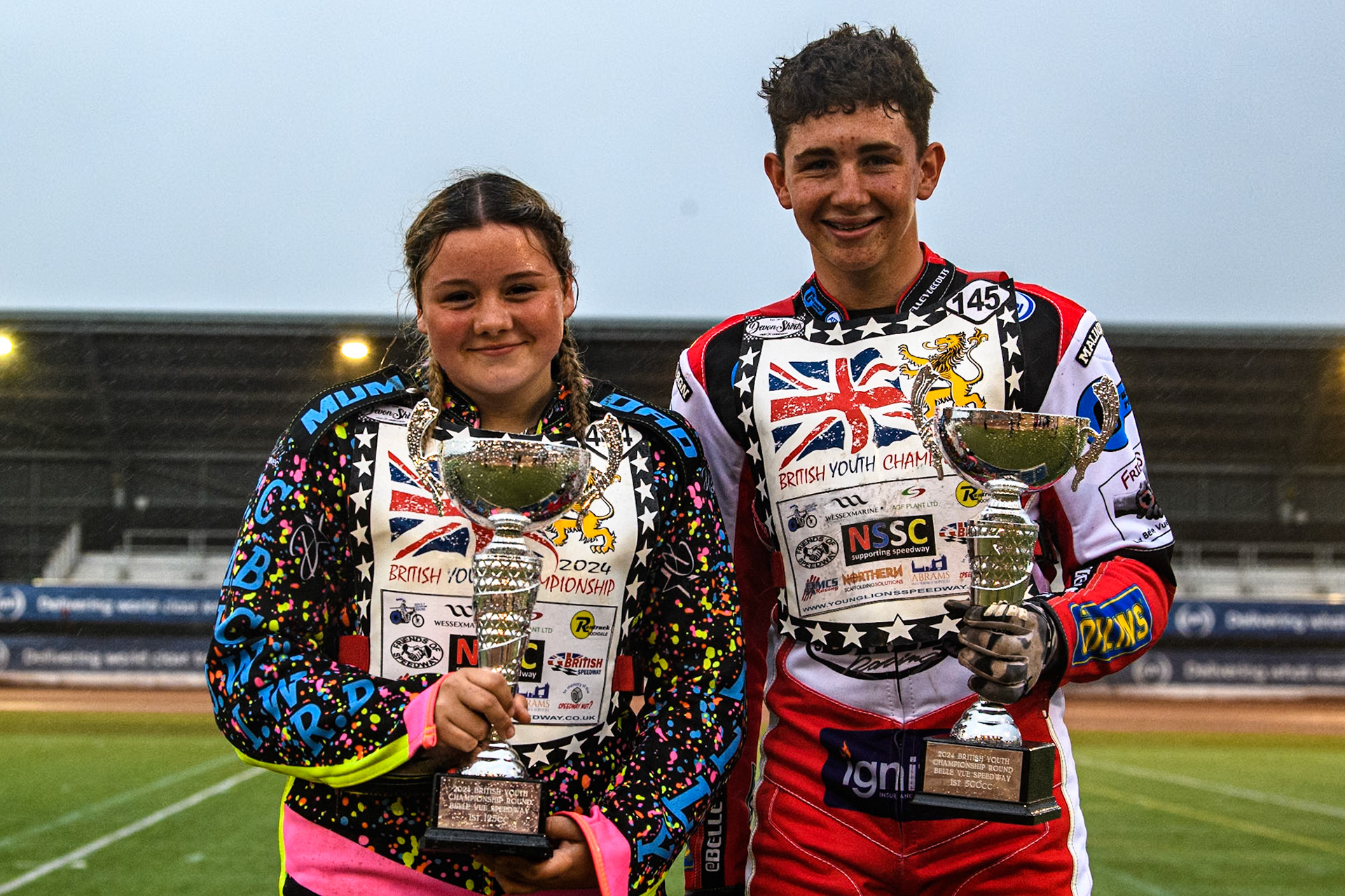 Tia May Brant (125cc winner) (Left) and William Cairns (500cc winner) during the WSRA National Development League match between Belle Vue Colts and Oxford Chargers at the National Speedway Stadium, Manchester on Friday 2nd August 2024. (Photo: Ian Charles | MI News)
