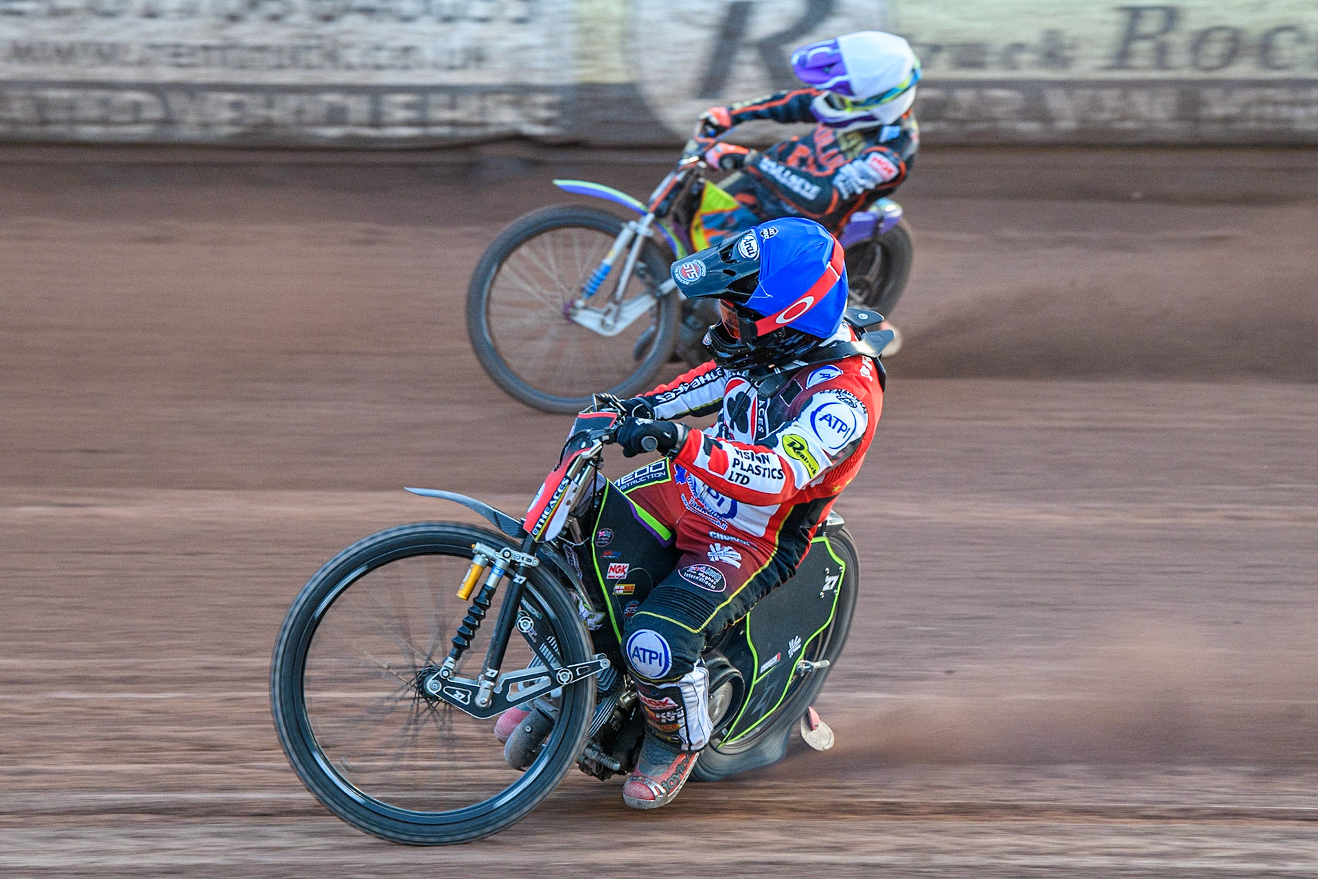 Tom Brennan (Blue) leads Rory Schlein (White) during the Sports Insure Premiership match between Belle Vue Aces and Wolverhampton Wolves at the National Speedway Stadium, Manchester on Monday 3rd July 2023. (Photo: Ian Charles | MI News)