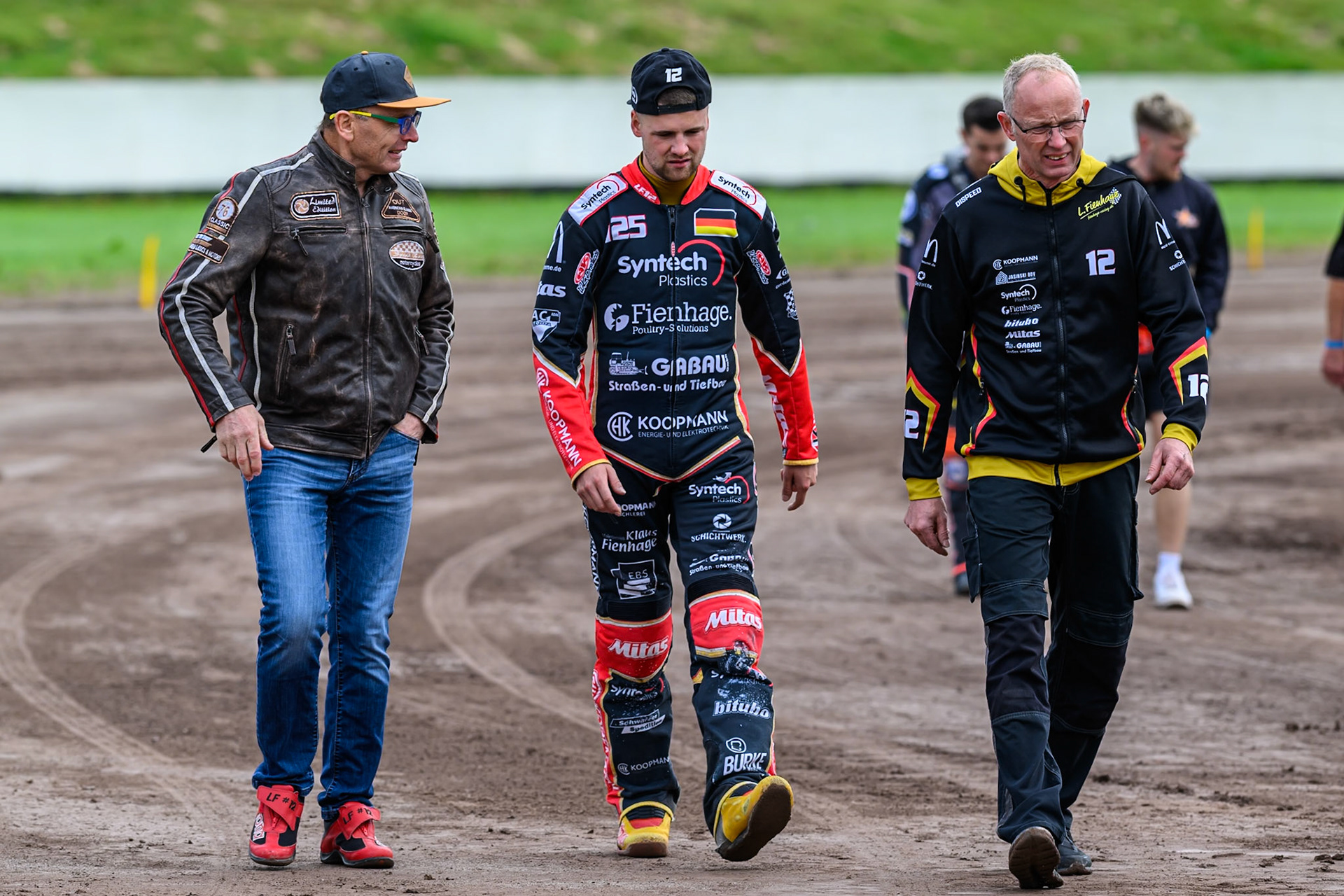 Lukas Fienhage (125) of Germany and his team walk the track during the FIM Long Track World Championship Final 4, at the Speed Centre Roden, Netherlands on Sunday 21st September 2025. (Photo: Ian Charles | MI News)