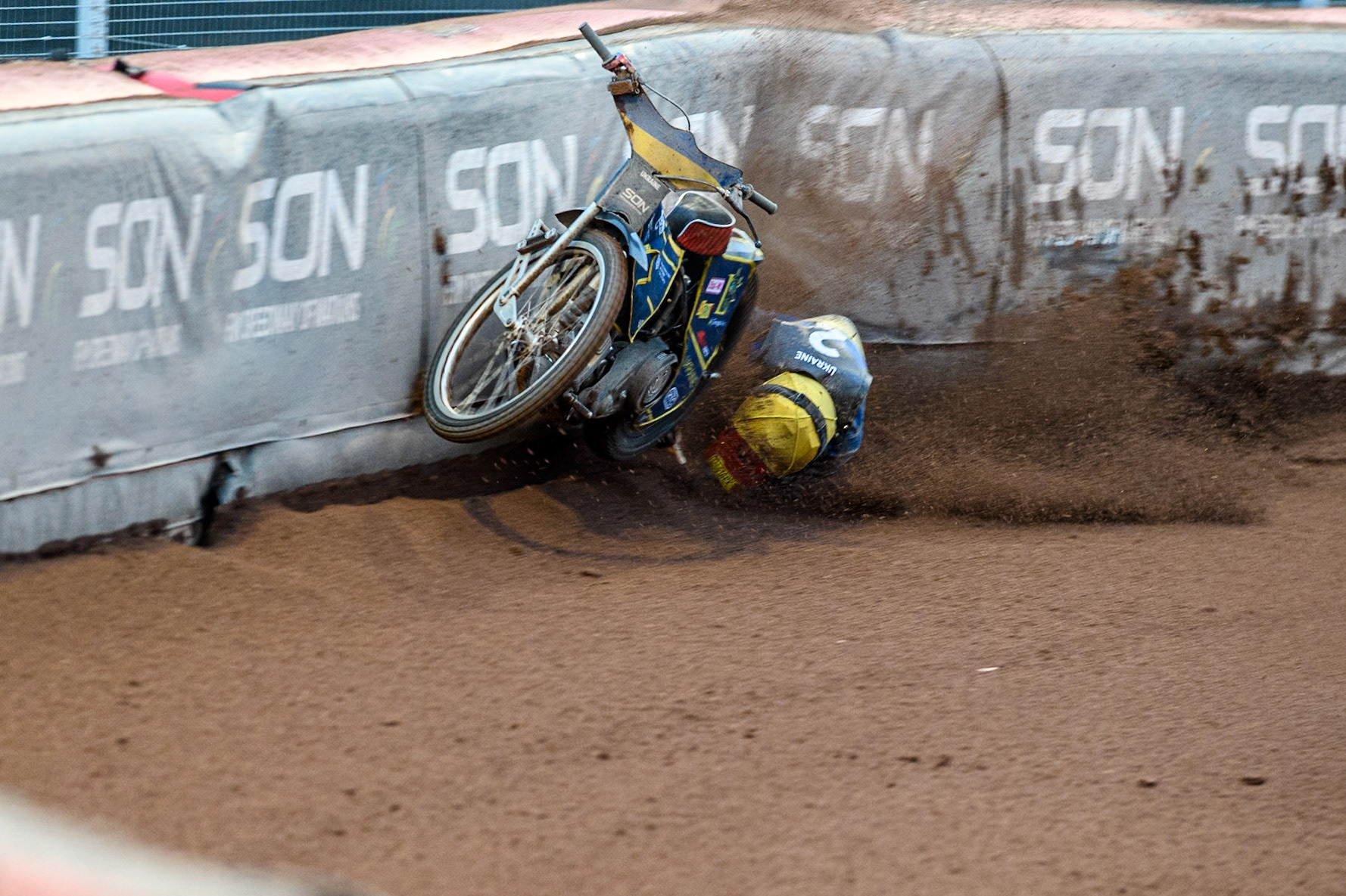 Marko Levishyn of Ukraine in Yellow crashes out of his final heat during the Monster Energy FIM Speedway of Nations Semi-Final 1 at the National Speedway Stadium, Manchester on Tuesday 9th July 2024. (Photo: Ian Charles | MI News)