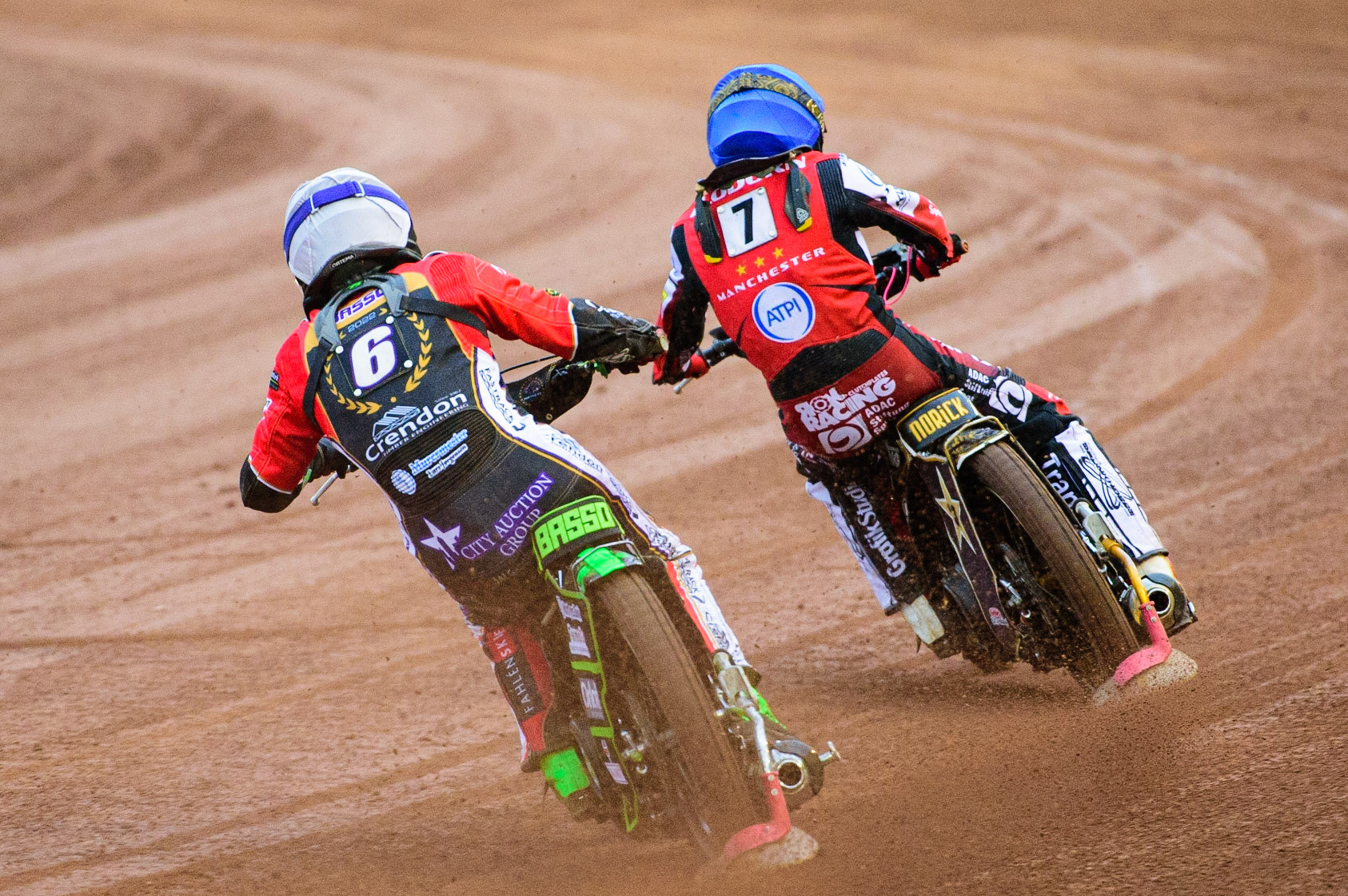 Benjamin Basso  (White) chases Norick Blödorn  (Blue) during the SGB Premiership match between Belle Vue Aces and Peterborough at the National Speedway Stadium, Manchester on Monday 25th July 2022. (Credit: Ian Charles | MI News