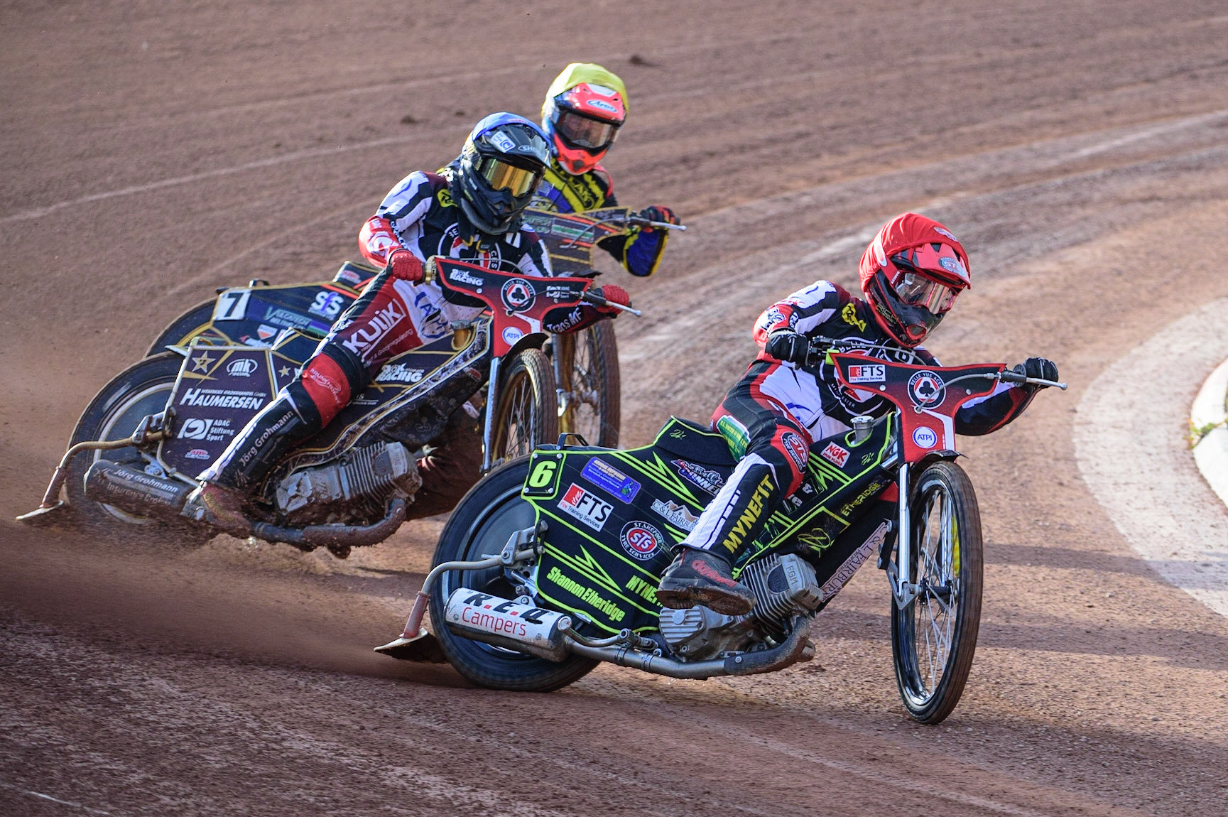 MANCHESTER, UK. JUL 5TH  Jye Etheridge  (Red) leads Norick Blodorn  (Blue) and Connor Mountain  (Yellow)  during the SGB Premiership match between Belle Vue Aces and Sheffield Tigers at the National Speedway Stadium, Manchester on Tuesday 5th July 2022. (Credit: Ian Charles | MI News)