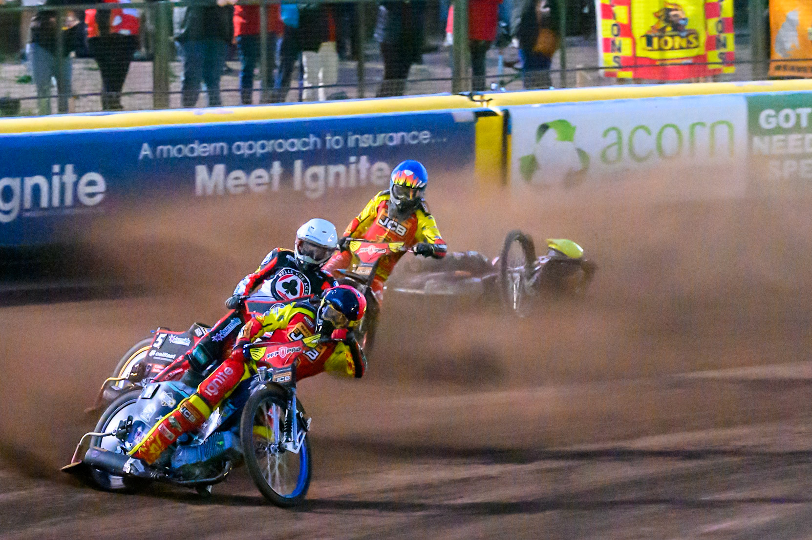 Ryan Douglas of Leicester Lions in Red leading Jason Doyle of Belle Vue Aces  in White  and Drew Kemp of Leicester Lions in Blue  as Tate Zischke of Belle Vue Aces  in Yellow  falls behind them during the Rowe Motor Oil Premiership match between Leicester Lions and Belle Vue Aces at the Hydroscan Arena, Leicester on Monday 7th September 2026. (Photo: Ian Charles | MI News)