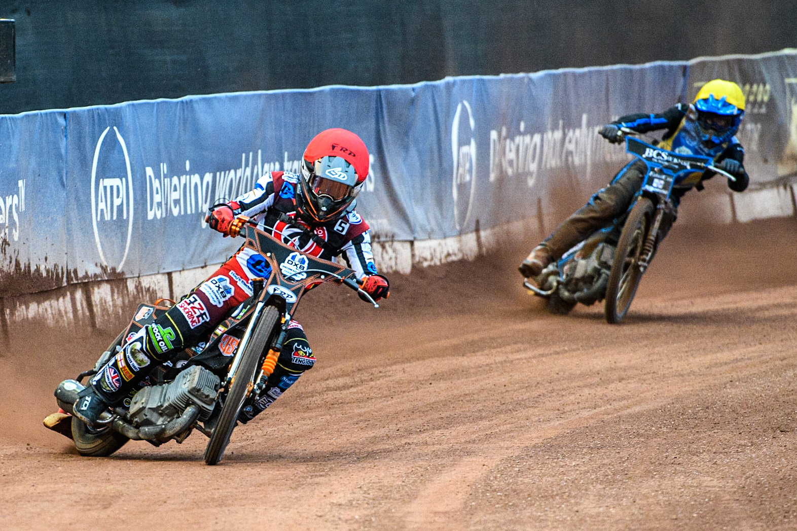 Jack Smith (Red) leads Ashton Boughen (Yellow) during the National Development League match between Belle Vue Colts and Edinburgh Monarchs Academy at the National Speedway Stadium, Manchester on Friday 21st July 2023. (Photo: Ian Charles | MI News)