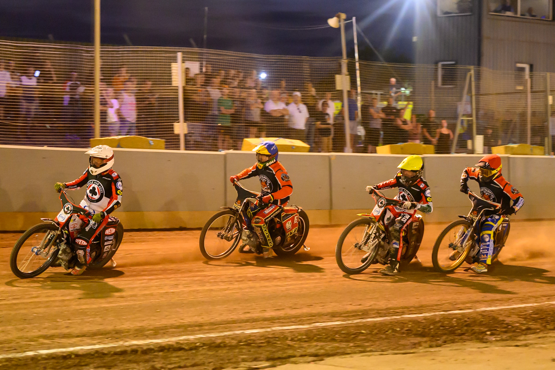 Peter Kildemand of Belle Vue Aces  in White leading Mitch McDiarmid of Northampton Foxes in Blue , Tate Zischke of Belle Vue Aces  in Yellow  and Justin Sedgmen Guest Rider for Northampton Foxes in Red during the Rowe Motor Oil Premiership match between Northampton Foxes and Belle Vue Aces at Northampton International Shaleway, Northampton on Thursday 13th August 2026. (Photo: Ian Charles | MI News)