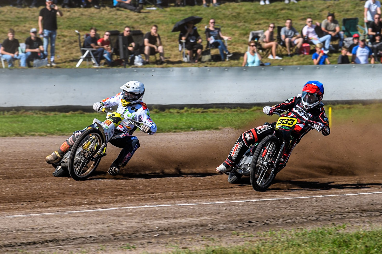 Kenneth Kruse Hansen (333) of Denmark in Blue rides inside Martin Smolinski (84) of Germany in White during the FIM Long Track World Championship Final 5 at the Speed Centre Roden, Roden, Netherlands on Sunday 22nd September 2024. (Photo: Ian Charles | MI News)