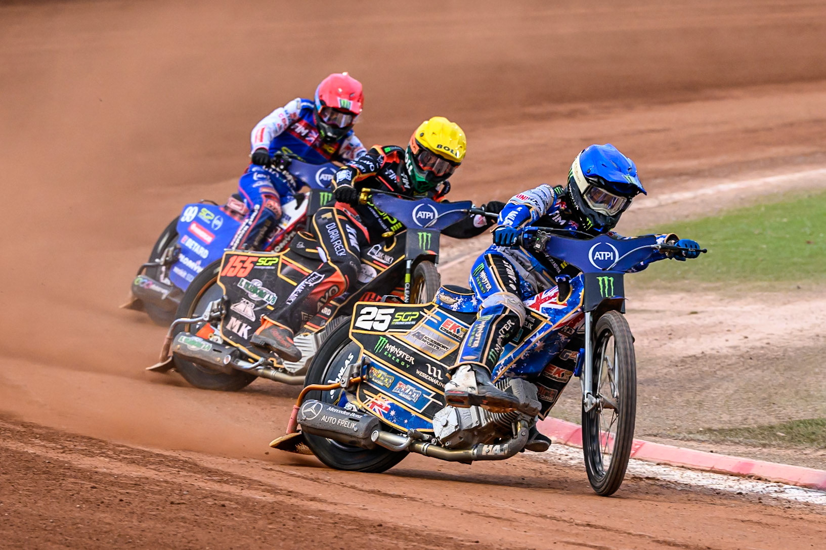 Jack Holder (25) of Australia in Blue leading Mikkel Michelsen (155) of Denmark in Yellow and Dan Bewley (99) of Great Britain in Red in the last chance qualifier 2 during the ATPI FIM Speedway Grand Prix Round 4 at the National Speedway Stadium, Manchester, on Friday 13th June 2025. (Photo: Ian Charles | MI News)