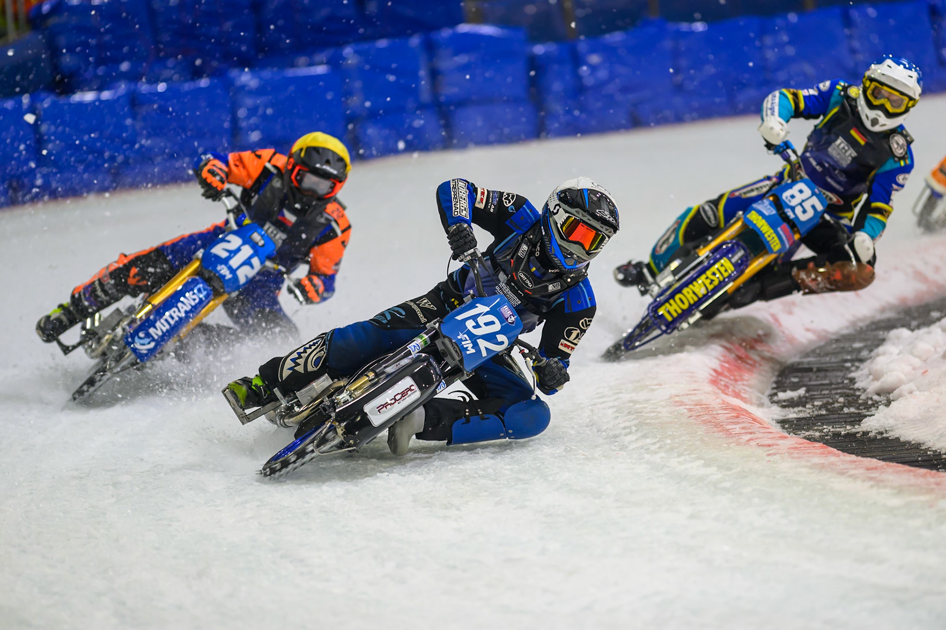 Niclas Svensson (192) of Sweden  in White leading Lukas Hutla (212) of Czechia  in Yellow and Luca Bauer (85) of Italy/Germany  in Blueduring the FIM Ice Speedway Gladiators World Championship Final 3 at Ice Rink Thialf, Heerenveen on Saturday 11th April 2026. (Photo: Ian Charles | MI News)
