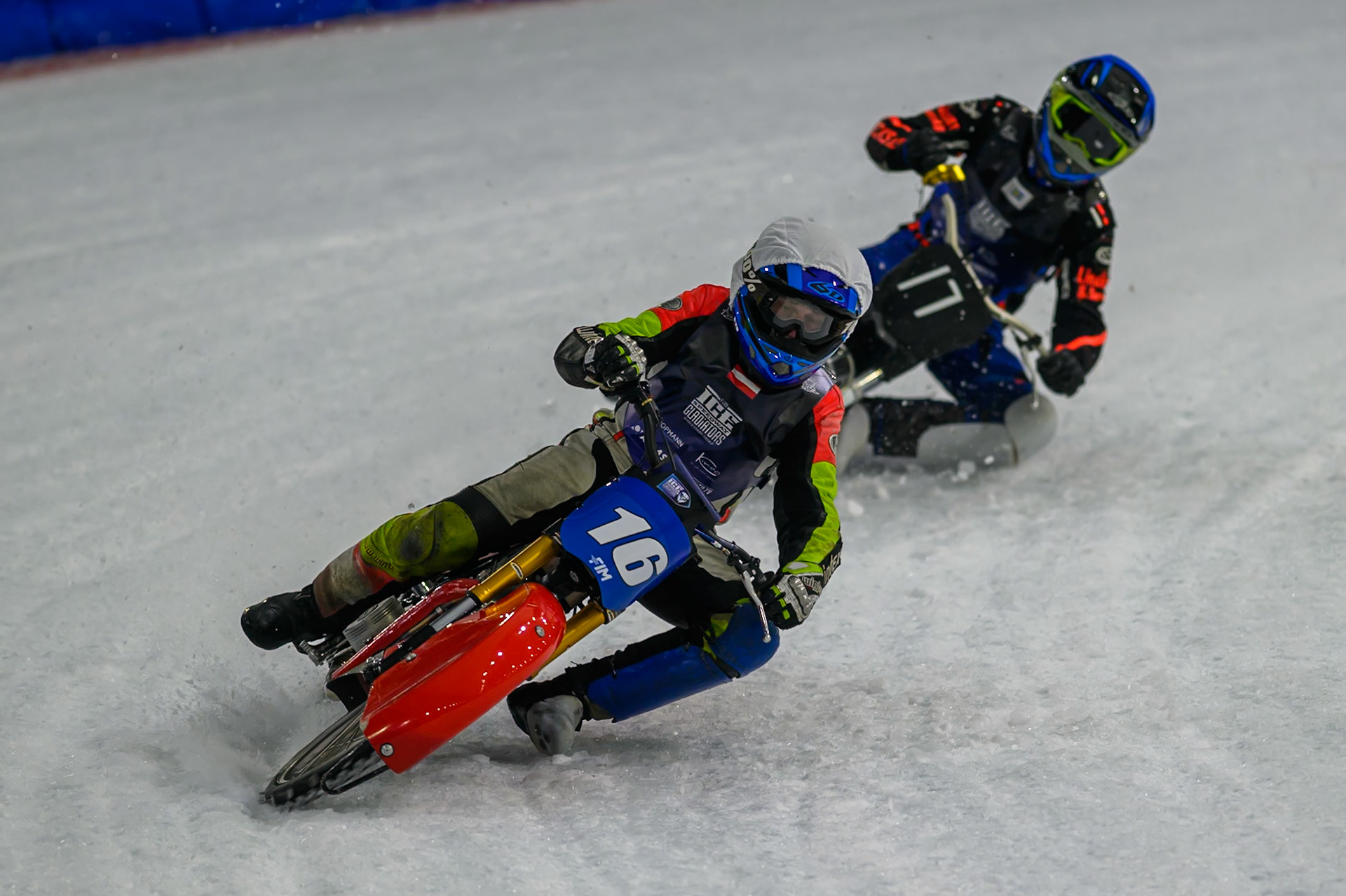 Lukas Hutla (212) of Czechia hits a rut in the ice in front of Andrej Divis (107) of Czechia in Blue during the FIM Ice Speedway Gladiators World Championship Final 3 at Ice Rink Thialf, Heerenveen on Saturday 11th April 2026. (Photo: Ian Charles | MI News)