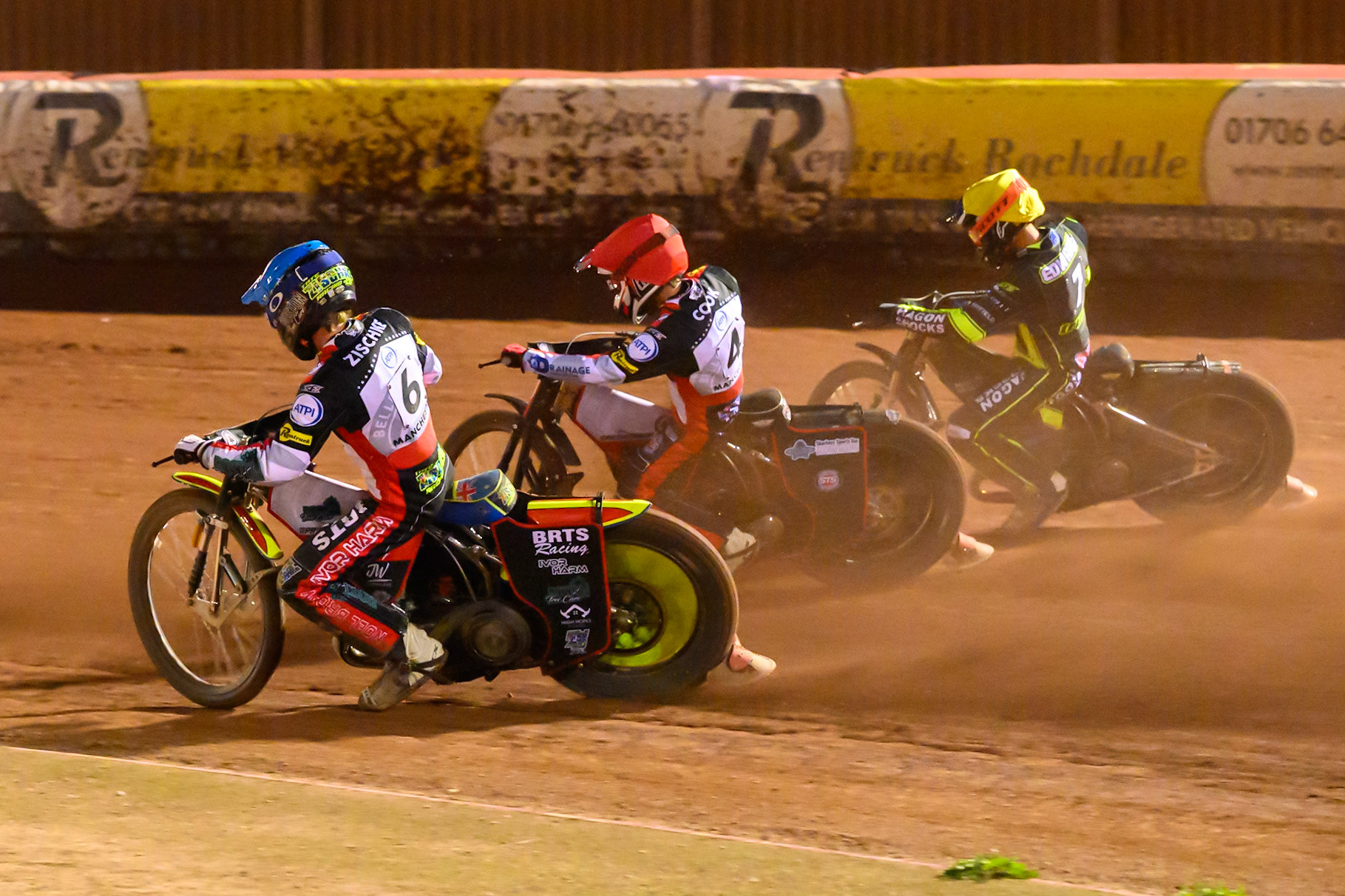 Tate Zischke of Belle Vue Aces  in Blue rides inside Zach Cook of Belle Vue Aces  in Red and Jason Edwards of Ipswich Witches  in Yellow during the Rowe Motor Oil Premiership match between Belle Vue Aces and Ipswich Witches at the National Speedway Stadium, Manchester on Monday 20th April 2026. (Photo: Ian Charles | MI News)