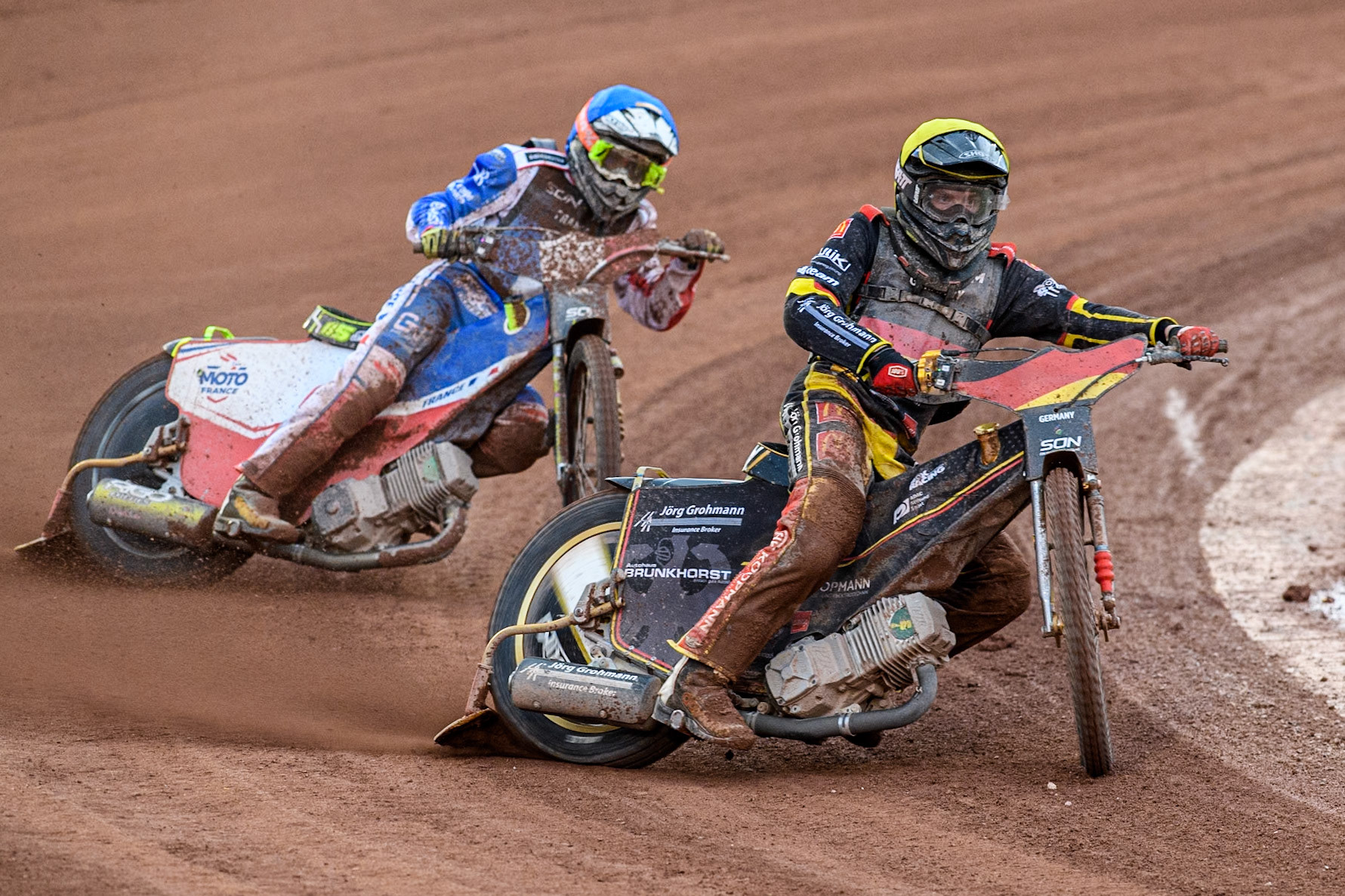 Norick Blödorn of Germany in Yellow leading Steven Goret of France in Blue during the Monster Energy FIM Speedway of Nations Semi-Final 1 at the National Speedway Stadium, Manchester on Tuesday 9th July 2024. (Photo: Ian Charles | MI News)