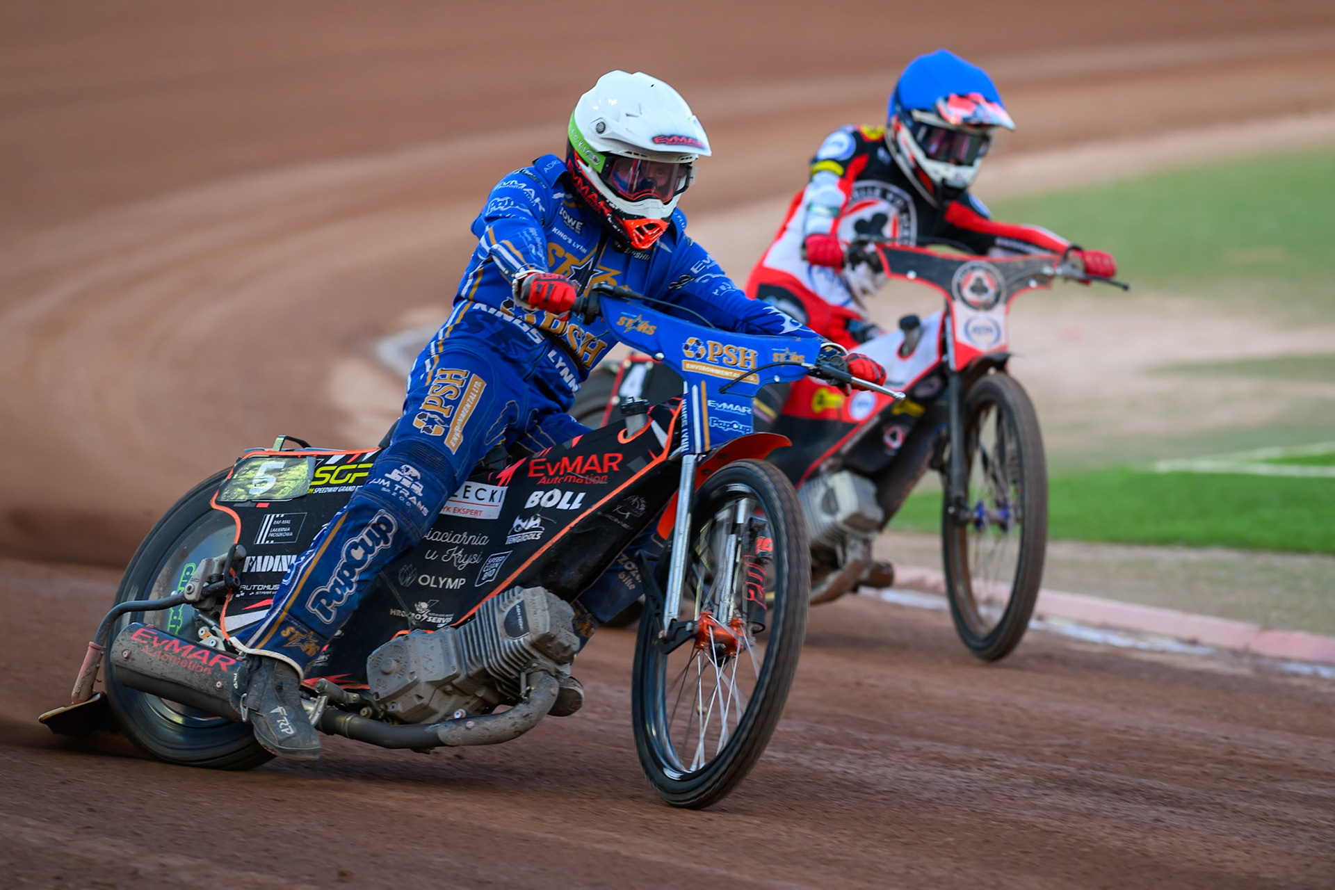 Jan Kvech of Kings Lynn Stars in White leading Zach Cook of Belle Vue Aces in Blue during the Rowe Motor Oil Premiership match between Belle Vue Aces and King's Lynn Stars at the National Speedway Stadium, Manchester on Monday 10th August 2026. (Photo: Ian Charles | MI News)