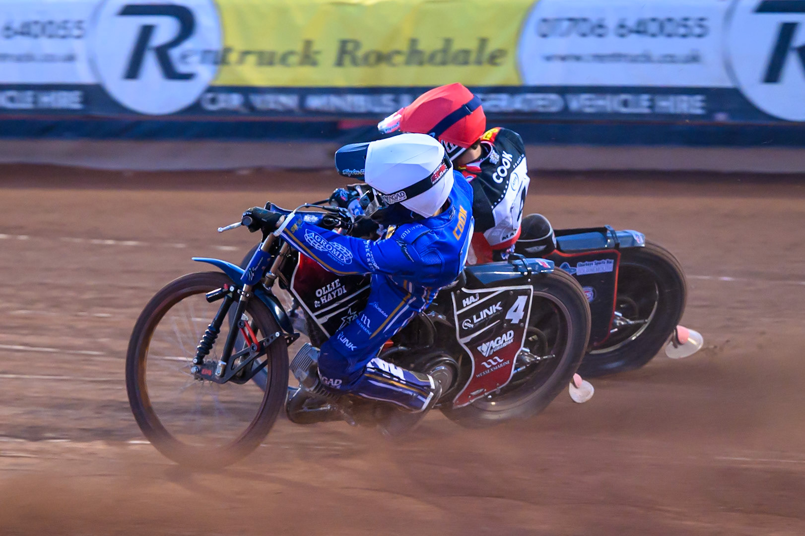 Ben Cook of Kings Lynn Stars in White rides inside Zach Cook of Belle Vue Aces in Red during the Rowe Motor Oil Premiership match between Belle Vue Aces and King's Lynn Stars at the National Speedway Stadium, Manchester on Monday 10th August 2026. (Photo: Ian Charles | MI News)