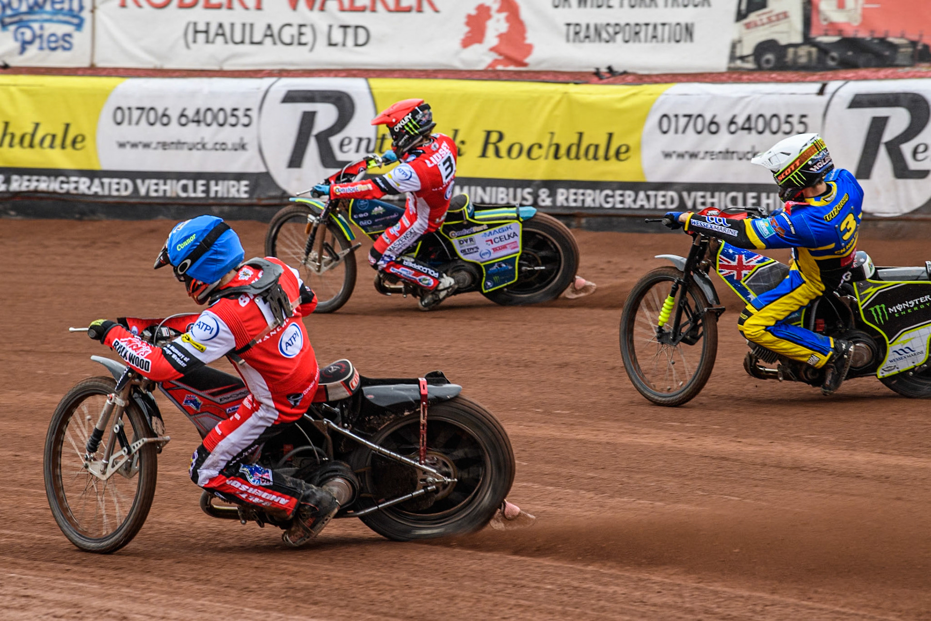 Belle Vue ATPI Aces Connor Bailey  (Blue) inside Belle Vue ATPI Aces Jaimon Lidsey (Red) and Sheffield Tigers' Chris Holder (White) during the Rowe Motor Oil Premiership KO Cup Quarter Final 1st Leg between Belle Vue Aces and Sheffield Tigers at the National Speedway Stadium, Manchester on Monday 1st April 2024. (Photo: Ian Charles | MI News)