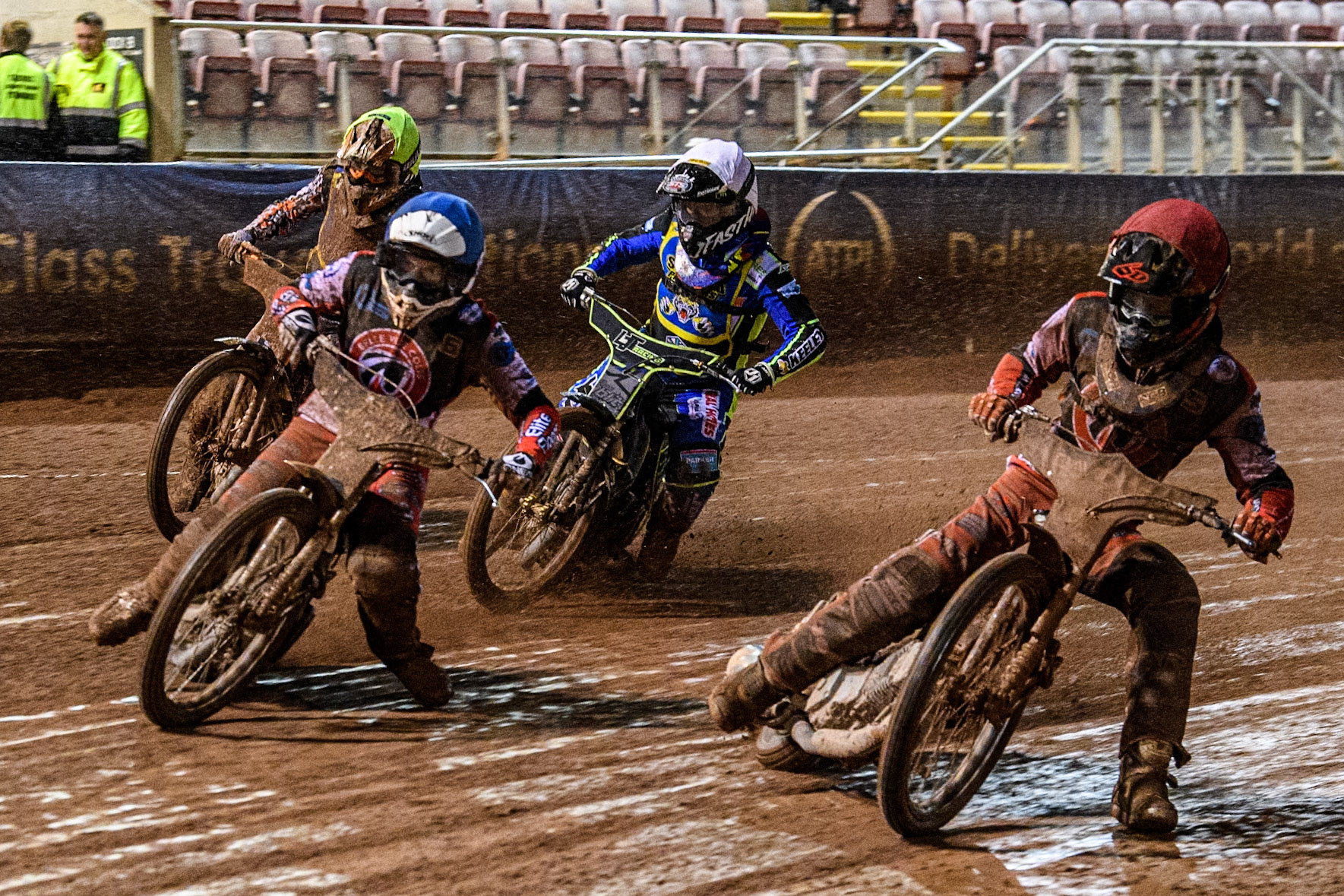 Belle Vue Colts' Freddy Hodder in Red and Belle Vue Colts' Chad Wirtzfeld in Blue leading Sheffield Cubs' Nathan Ablitt in White and Sheffield Cubs' Mickie Simpson in Yellow during the WSRA National Development League match between Belle Vue Colts and Sheffield Tiger Cubs at the National Speedway Stadium, Manchester on Monday 7th October 2024. (Photo: Ian Charles | MI News)