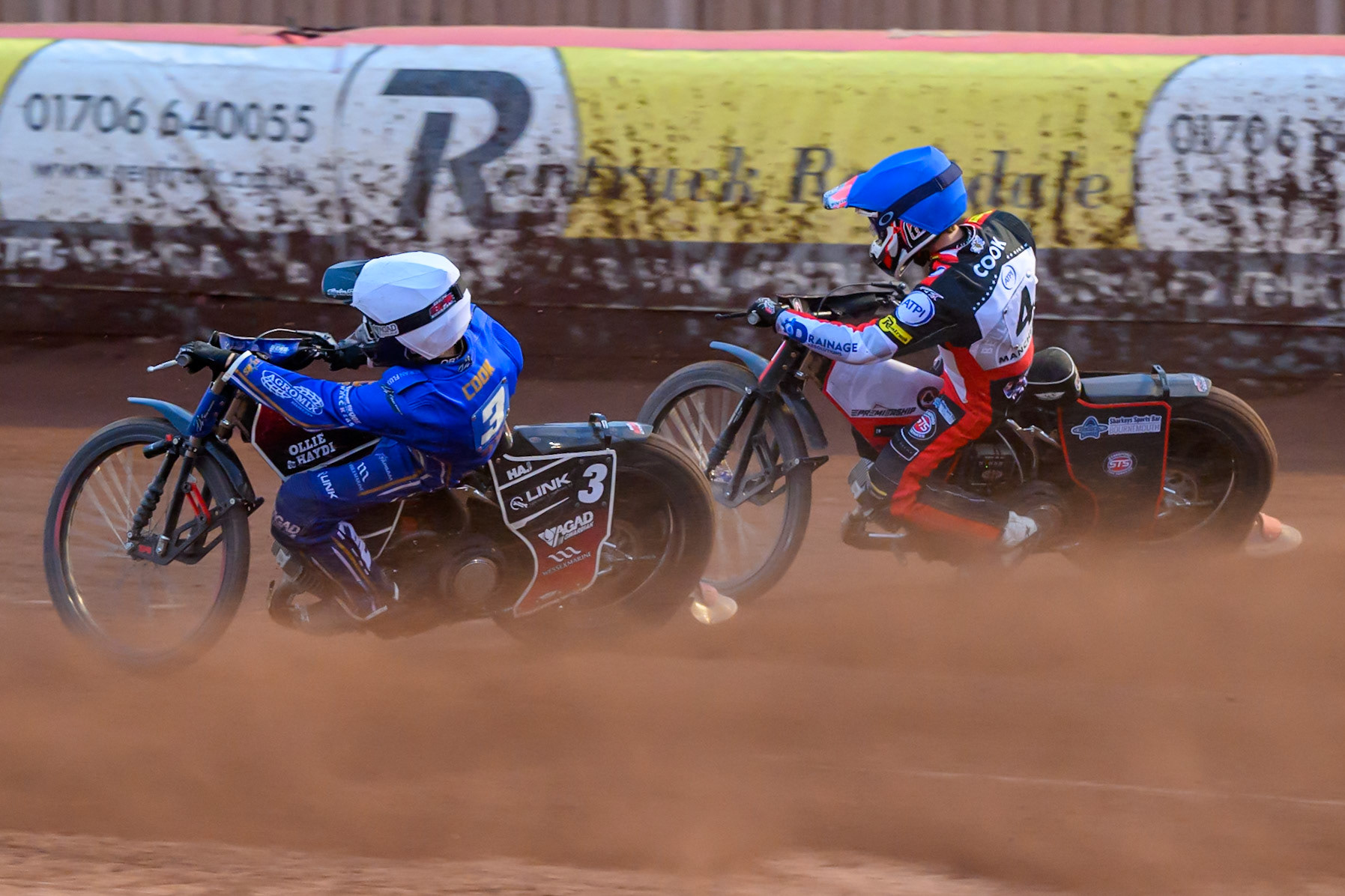Ben Cook of Kings Lynn Stars in White rides inside Zach Cook of Belle Vue Aces in Blue  during the Rowe Motor Oil Premiership match between Belle Vue Aces and King's Lynn Stars at the National Speedway Stadium, Manchester on Monday 29th June 2026. (Photo: Ian Charles | MI News)