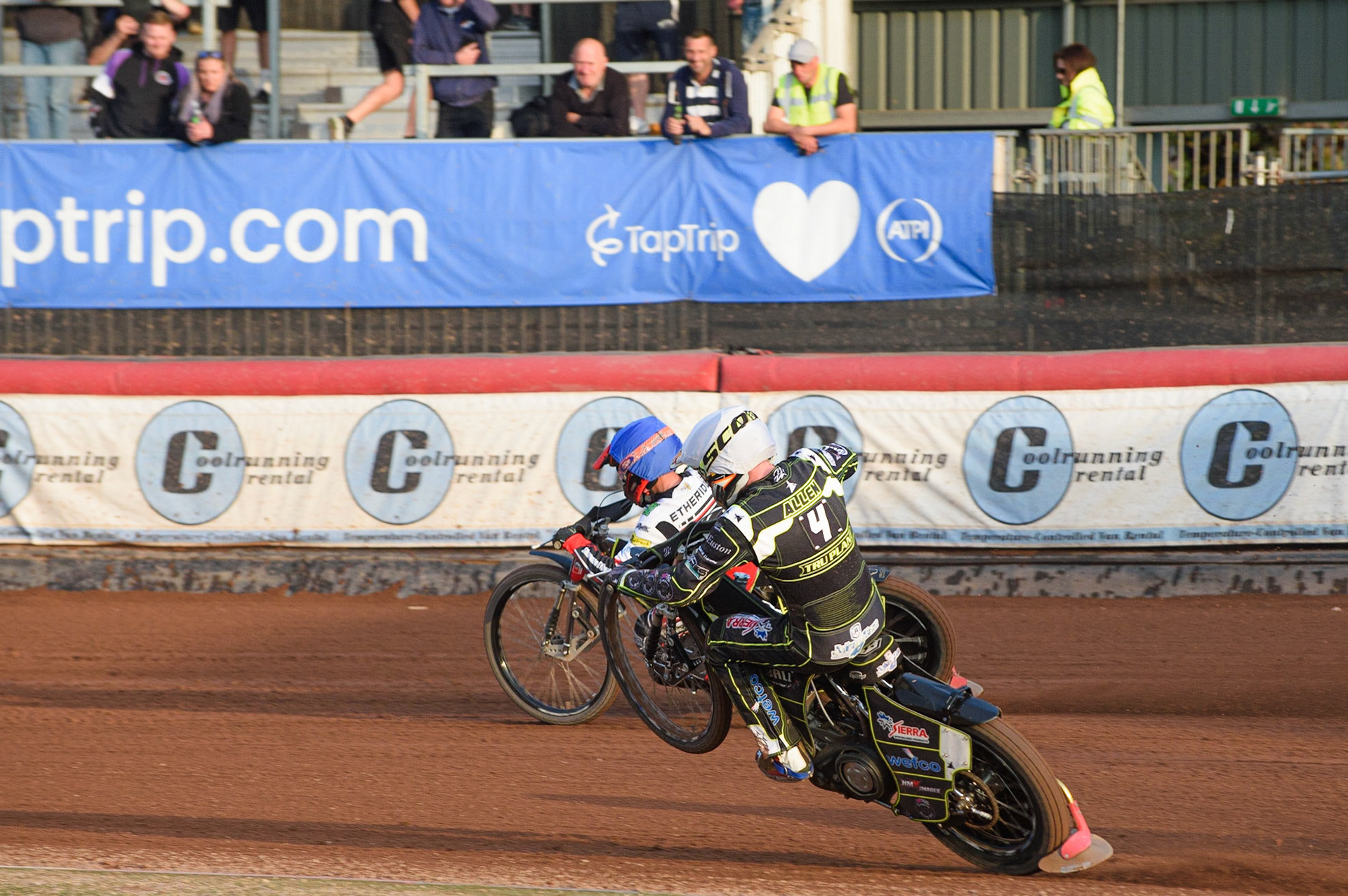 MANCHESTER, UK. JUNE 7TH   Jake Allen  (White) picks up some drive chasing Jye Etheridge (Blue) during the SGB Premiership match between Belle Vue Aces and Ipswich Witches at the National Speedway Stadium, Manchester on Monday 7th June 2021. (Credit: Ian Charles | MI News)