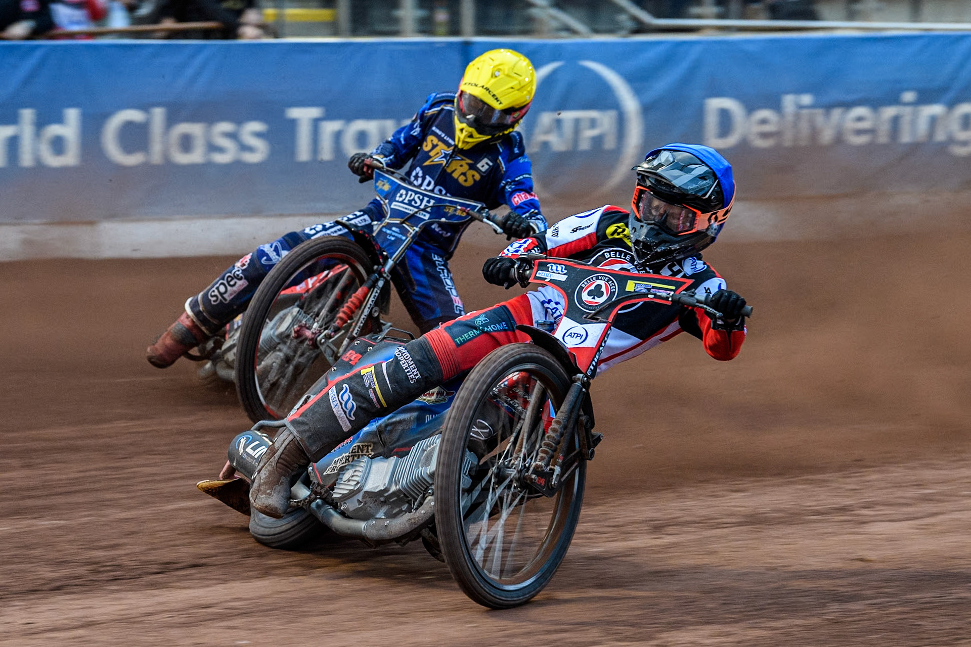 Belle Vue Aces' Ben Cook in Blue leading King Lynn Stars' Patryk Wojdylo in Yellow during the Rowe Motor Oil Premiership match between Belle Vue Aces and King's Lynn Stars at the National Speedway Stadium, Manchester on Monday 20th May 2024. (Photo: Ian Charles | MI News)