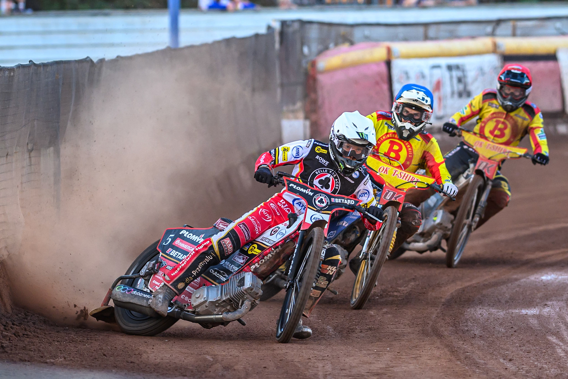 Belle Vue Aces' Dan Bewley  in White leading Birmingham Brummies' Paco Castagna in Blue and Birmingham Brummies' Tobias Musielak in Red during the Rowe Motor Oil Premiership match between Birmingham Brummies and Belle Vue Aces at Perry Barr Stadium, Birmingham on Monday 28th July 2025. (Photo: Ian Charles | MI News)