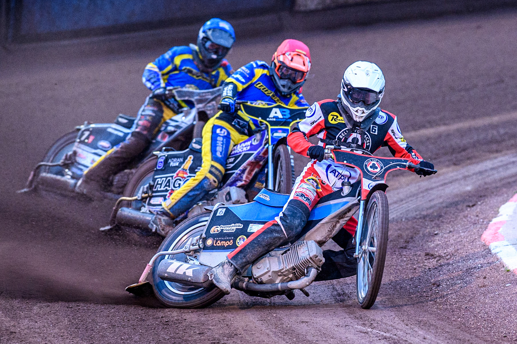 Belle Vue Aces' Antti Vuolas  in White leading Sheffield Tigers' Jason Edwards  in Red and Sheffield Tigers' Guest Rider Joe Thompson  in Blue during the Rowe Motor Oil Premiership match between Sheffield Tigers and Belle Vue Aces at Owlerton Stadium, Sheffield on Monday 26th August 2024. (Photo: Ian Charles | MI News)