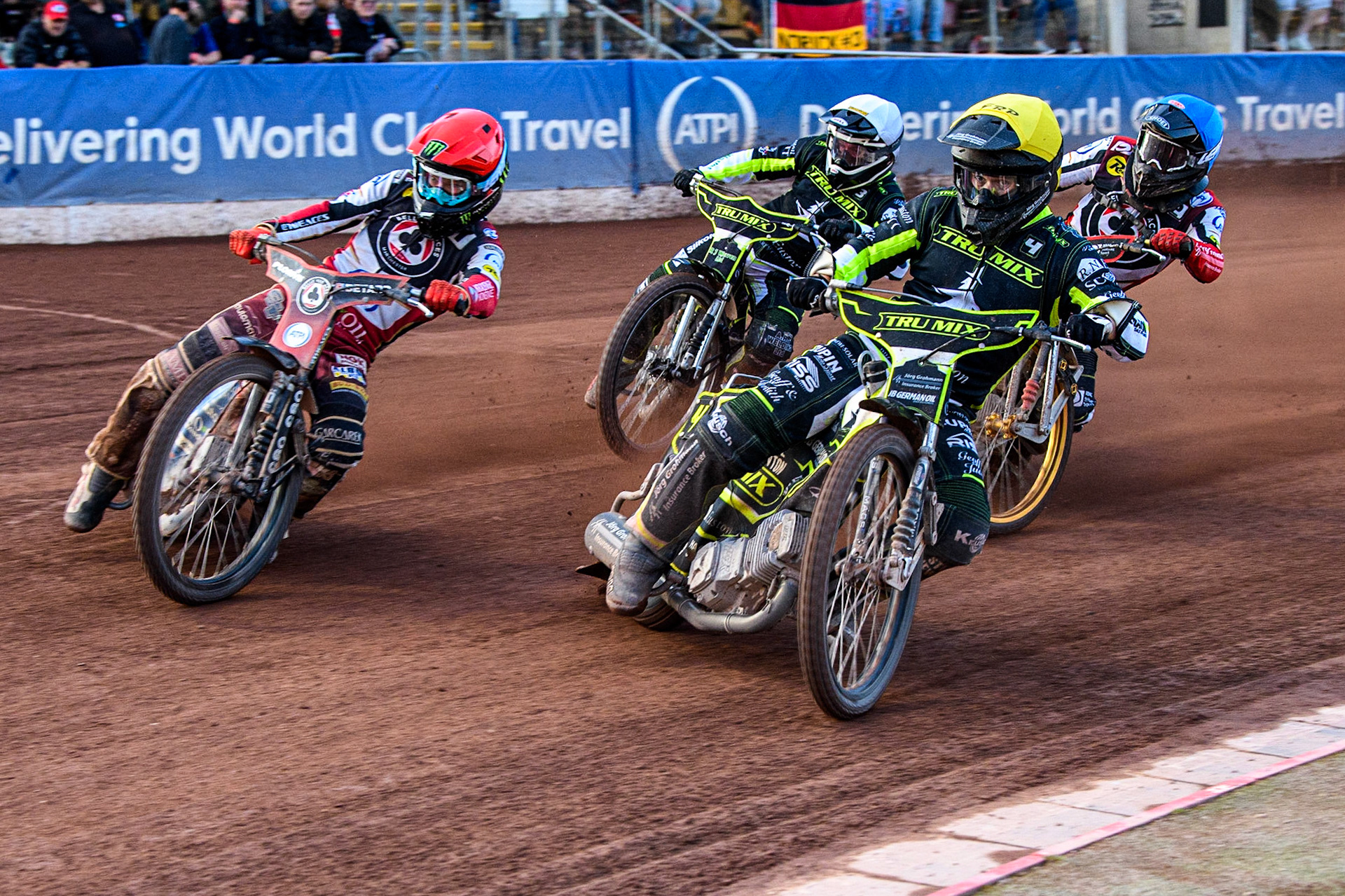 Erik Riss (Yellow) inside Dan Bewley (Red) with Norick Blodorn (Blue) and Danny King (White) behind during the Sports Insure Premiership match between Belle Vue Aces and Ipswich Witches at the National Speedway Stadium, Manchester on Monday 17th July 2023. (Photo: Ian Charles | MI News)