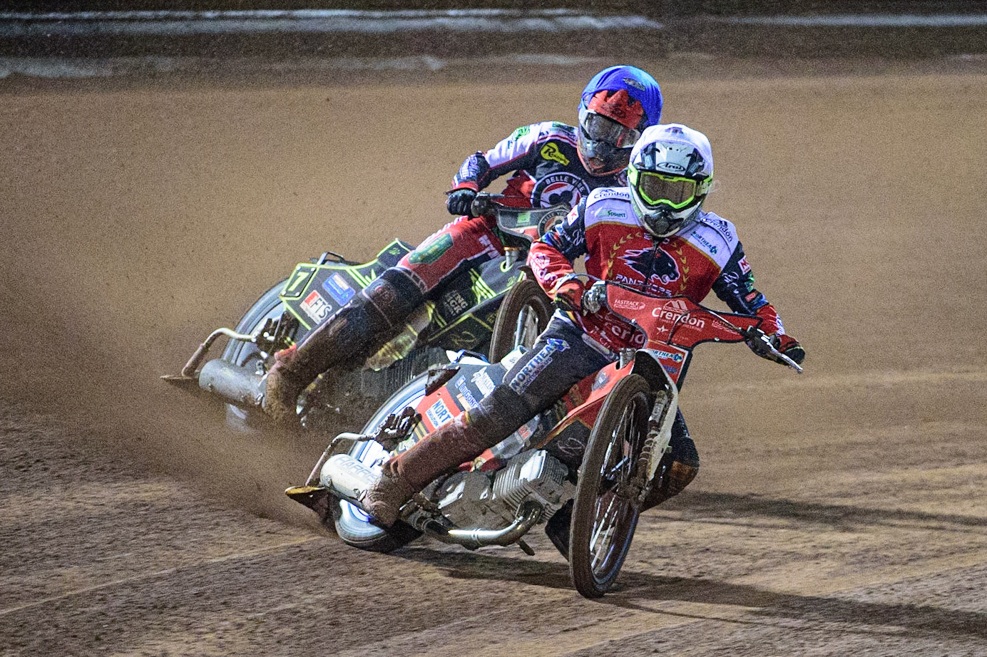 MANCHESTER, UK. OCT 11TH  Chris Harris  (White) leads Jye Etheridge  (Blue) during the SGB Premiership Grand Final 1st Leg between Belle Vue Aces and Peterborough Panthers at the National Speedway Stadium, Manchester on Monday 11th October 2021. (Credit: Ian Charles | MI News)