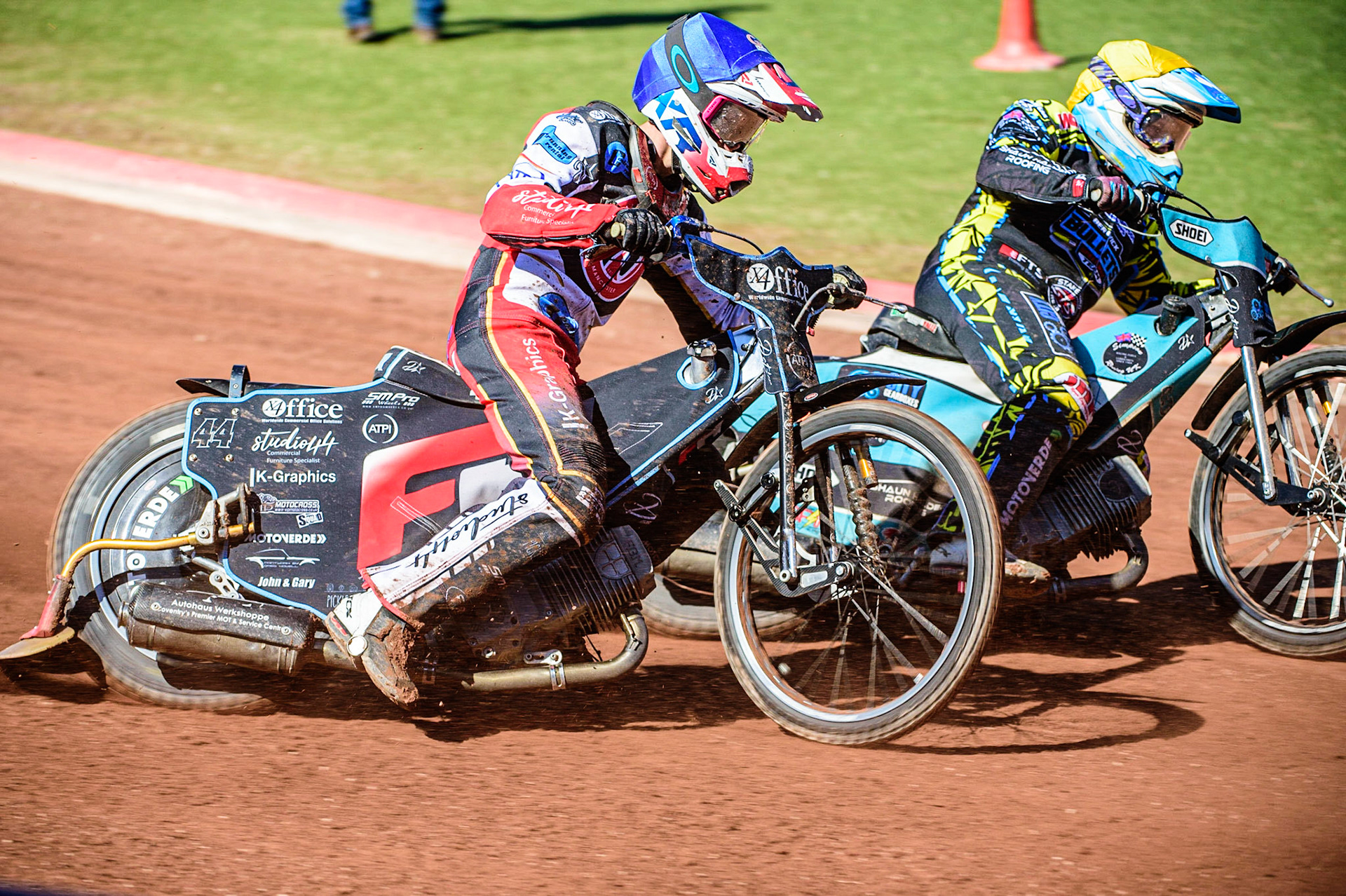 Freddy Hodder   (Blue) outside Jamie Halder during the National Development League match between Belle Vue Colts and Berwick Bullets at the National Speedway Stadium, Manchester on Friday 7th April 2023. (Photo: Ian Charles | MI News)