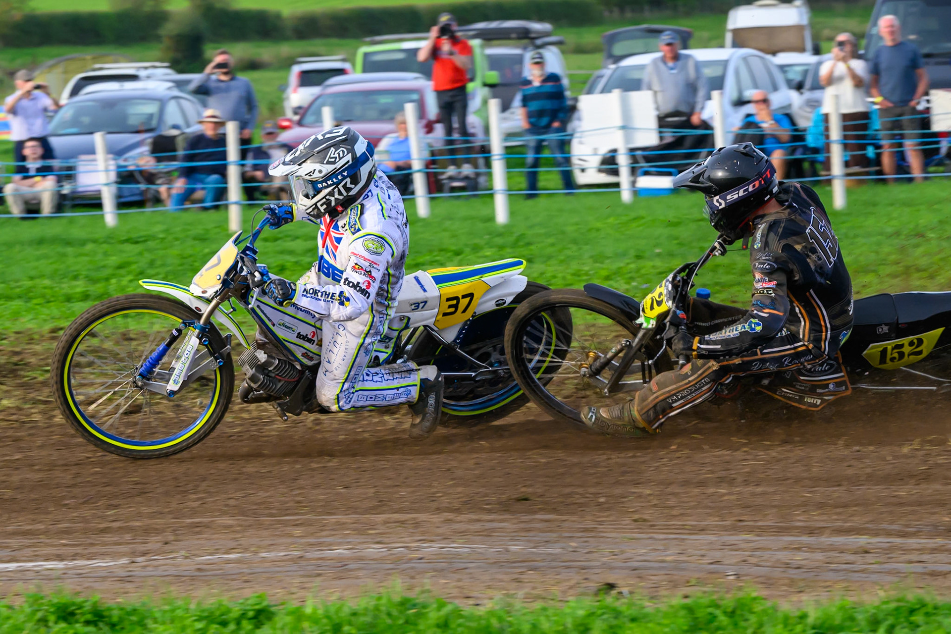British Masters (Solos): Ashton Vale (152) catches the back wheel of Chris Harris (37)  and comes off during the British Masters Grasstrack Championship at Lower Marsh Farm, Much Hoole, Preston in Lancashire, England on Sunday 13th September 2026. (Photo: Ian Charles | MI News)