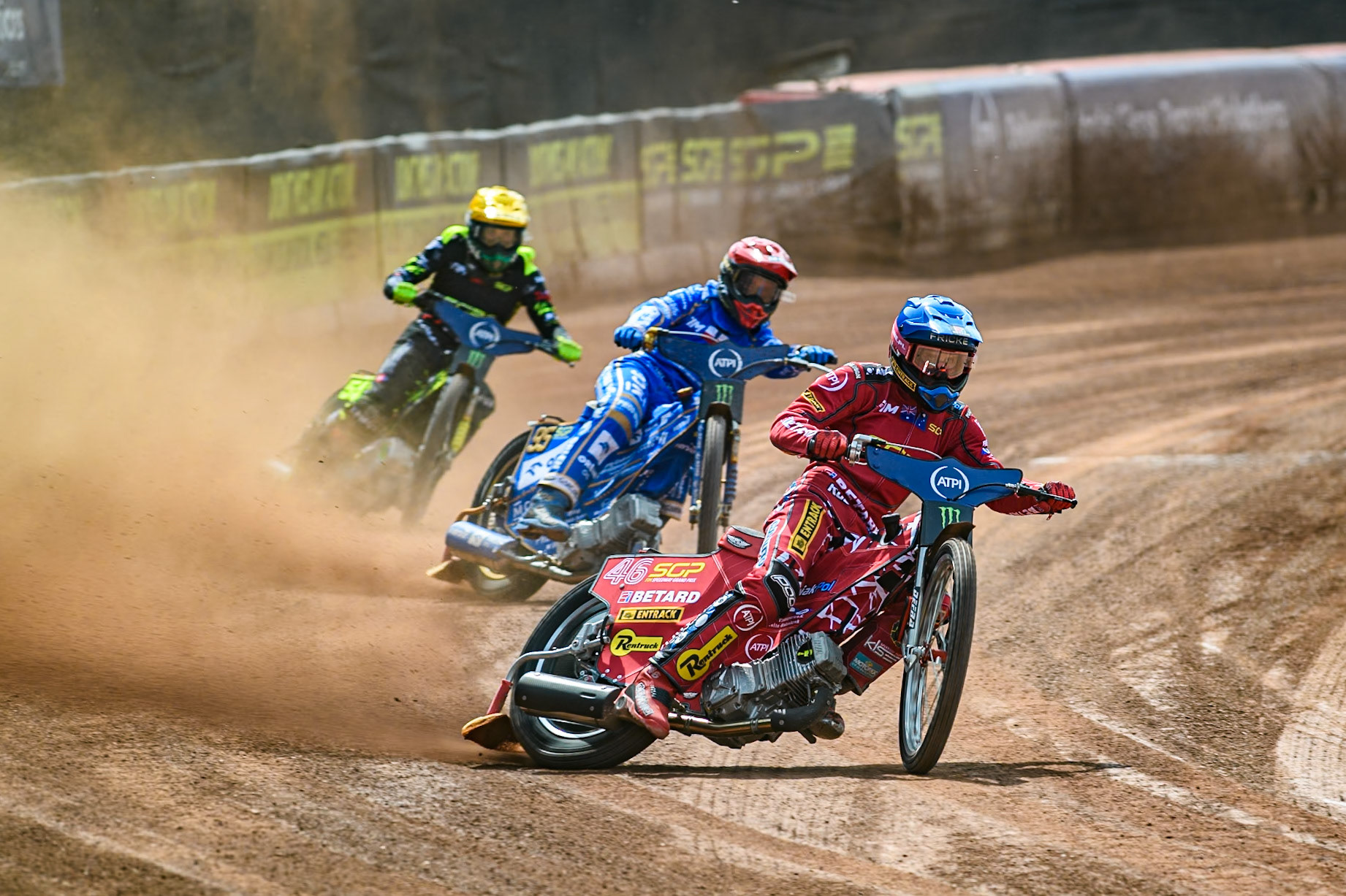 Max Fricke (46) of Australia in Blue leading Bartosz Zmarzlik (95) of Poland in Red and Martin Vaculik (54) of Slovakia in Yellow in the sprint race during the ATPI FIM Speedway Grand Prix Round 4 at the National Speedway Stadium, Manchester, on Friday 6th June 2025. (Photo: Ian Charles | MI News)