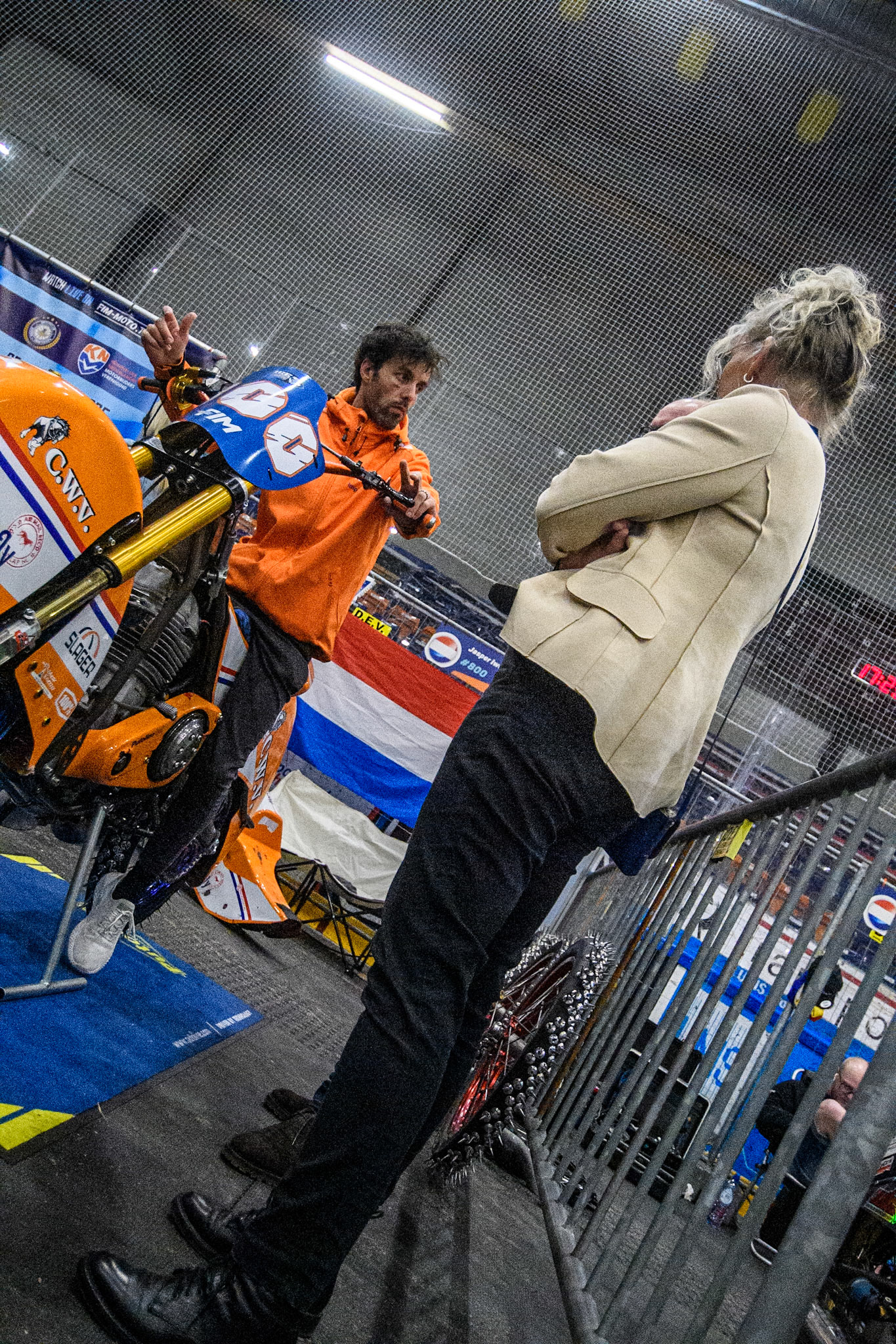 Jasper Iwema (800) of The Netherlands (sat on ice bike) chats with a sponsor in the pits before  the FIM Ice Speedway Gladiators World Championship, Final 3 at the Ice Stadium, Thialf, Heerenveen on Saturday 5th April 2025. (Photo: Ian Charles | MI News)