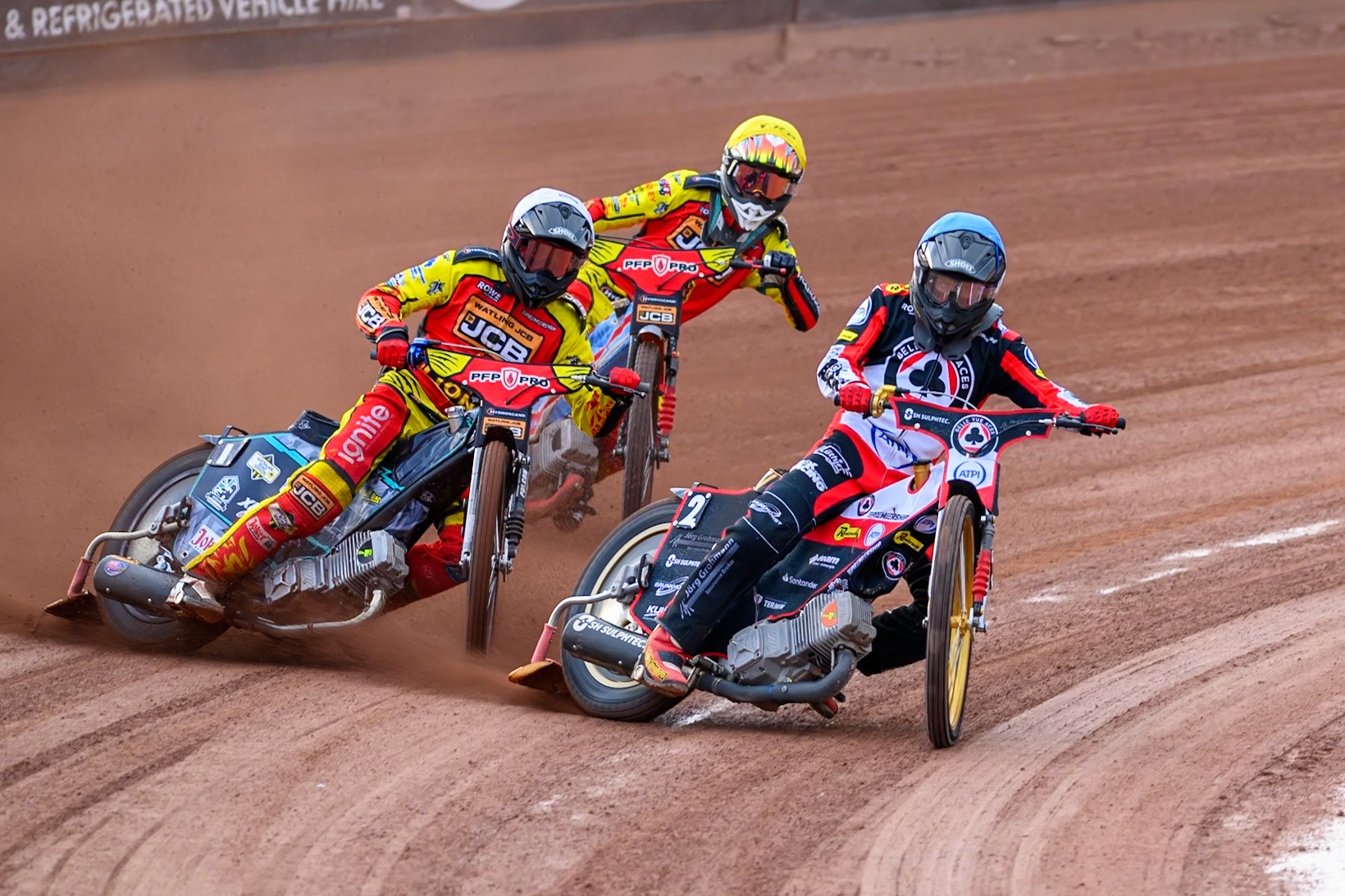Norick Blödorn of Belle Vue Aces in Blue leading Ryan Douglas of Leicester Lions in White and Drew Kemp of Leicester Lions in Yellow during the Rowe Motor Oil Premiership match between Belle Vue Aces and Leicester Lions at the National Speedway Stadium, Manchester on Monday 3rd August 2026. (Photo: Ian Charles | MI News)