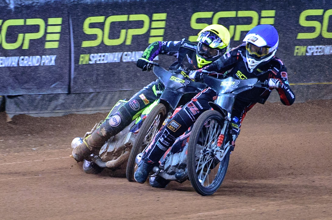 Jan Kvech (Czech Republic) (Blue) forces his way past Tom Brennan (Great Britain)  (Yellow) during the FIM  Speedway Grand Prix  2 of Great Britain at the Principality Stadium, Cardiff on Sunday 14th August 2022. (Credit: Ian Charles | MI News)