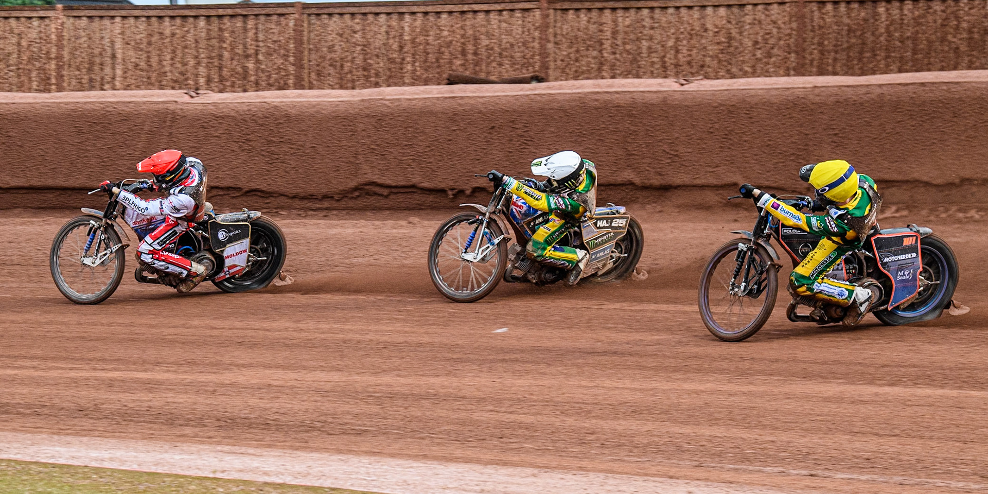 Rasmus Jensen of Denmark in Red leading Jack Holder of Australia in White and Brady Kurtz of Australia in Yellow during the Monster Energy FIM Speedway of Nation Semi Final 2 at the National Speedway Stadium, Manchester on Wednesday 10th July 2024. (Photo: Ian Charles | MI News)