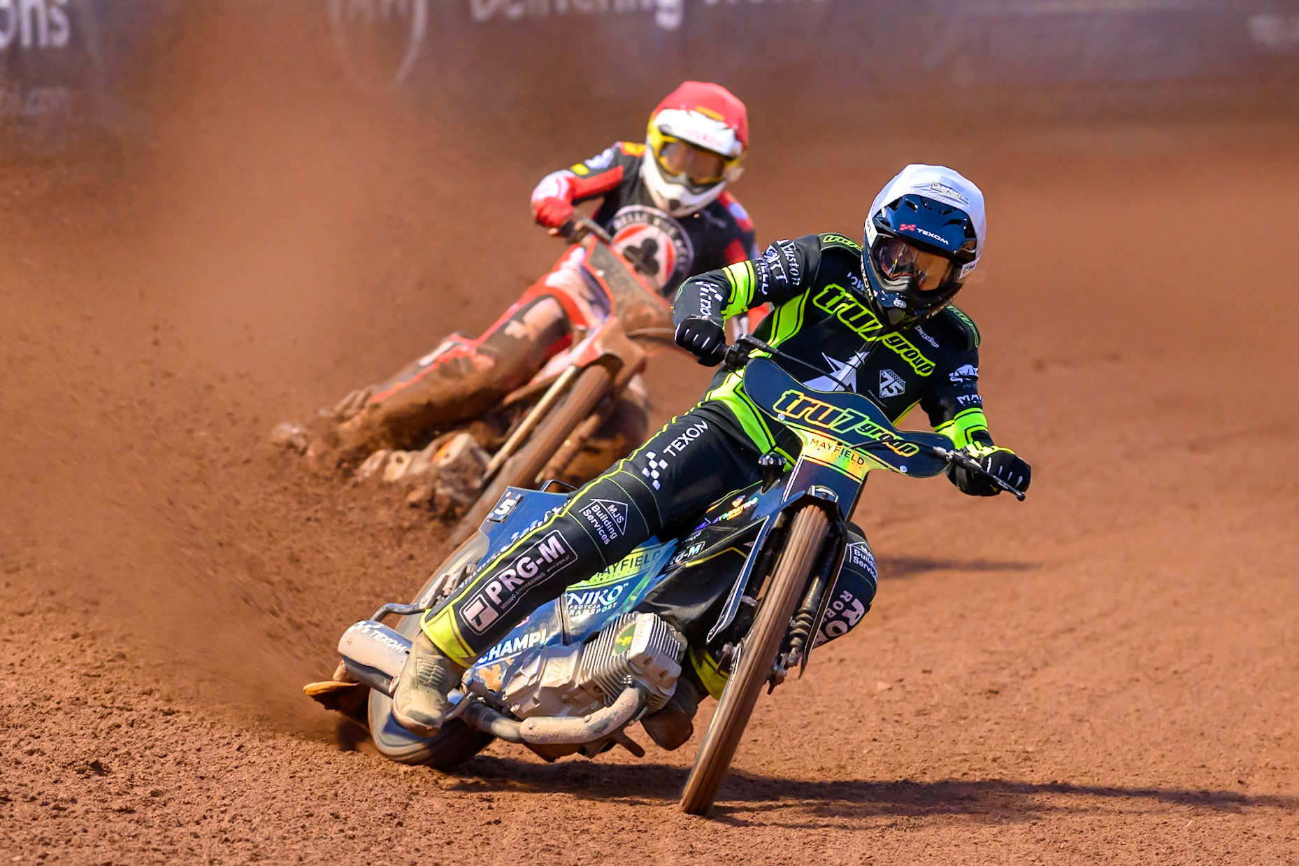 Tobiasz Musielak of Ipswich Witches  in White leading Peter Kildemand of Belle Vue Aces  in Red during the Rowe Motor Oil Premiership match between Belle Vue Aces and Ipswich Witches at the National Speedway Stadium, Manchester on Monday 20th April 2026. (Photo: Ian Charles | MI News)