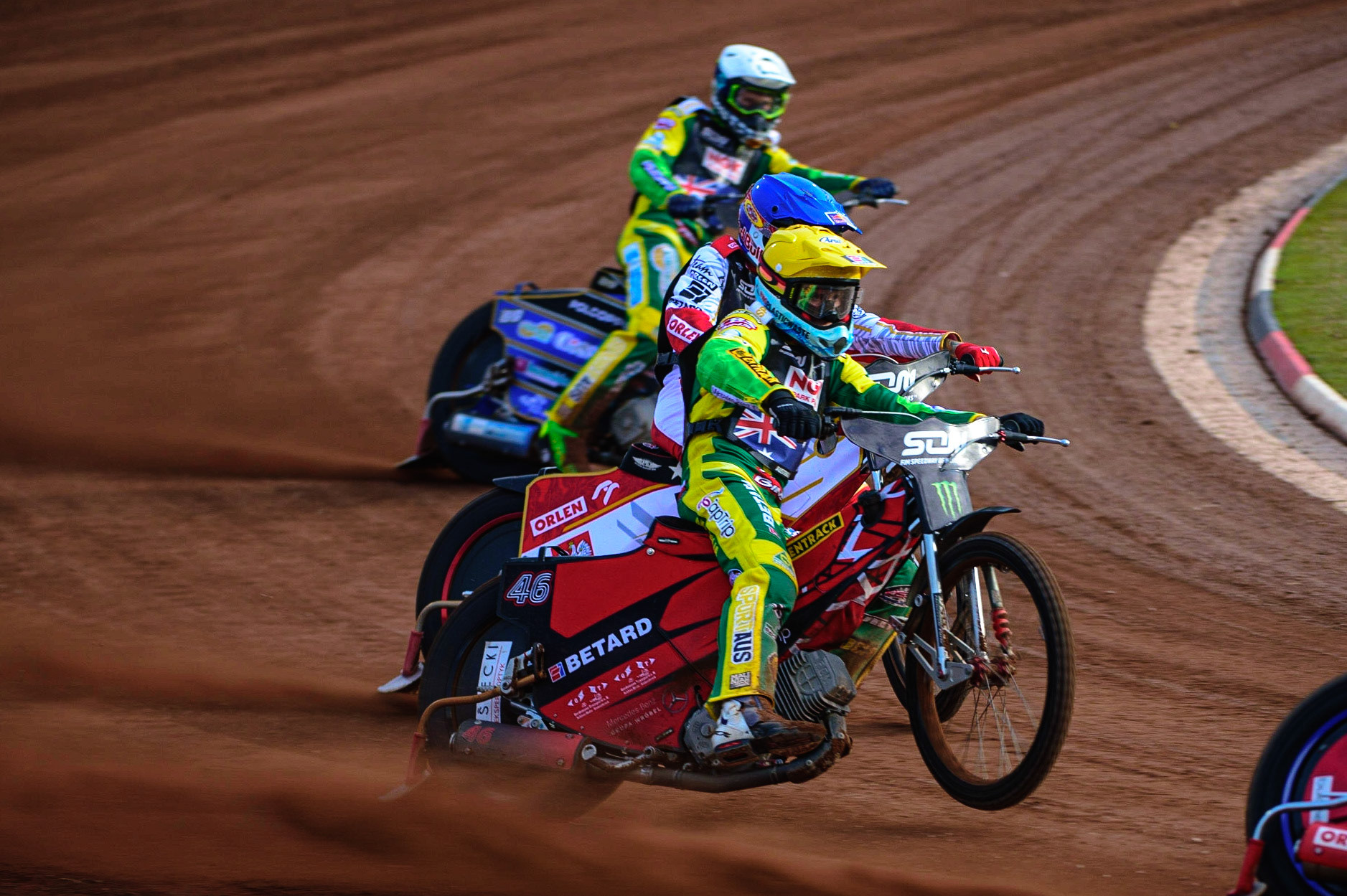 MANCHESTER, UK. OCT 16TH Max Fricke of Australia (Yellow) picks up some drive as he leads Maciej Janowski of Poland (Blue) and Jason Doyle of Australia (White) during the Monster Energy FIM Speedway of Nations at the National Speedway Stadium, Manchester on Saturday  16th October 2021. (Credit: Ian Charles | MI News)
