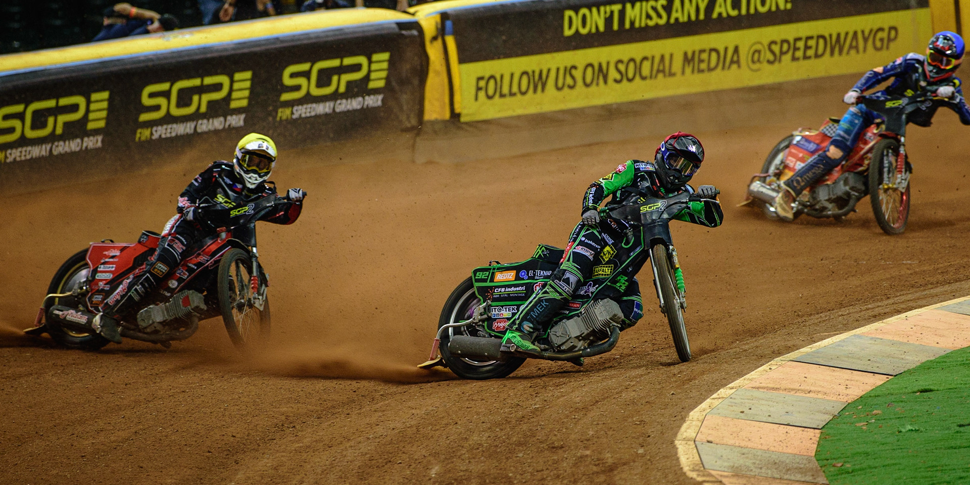 Benjamin Basso (Denmark)  (Red) inside Jan Kvech (Czech Republic)  (White) with Drew Kemp (Great Britain)  (Blue) behind during the FIM  Speedway Grand Prix  2 of Great Britain at the Principality Stadium, Cardiff on Sunday 14th August 2022. (Credit: Ian Charles | MI News)