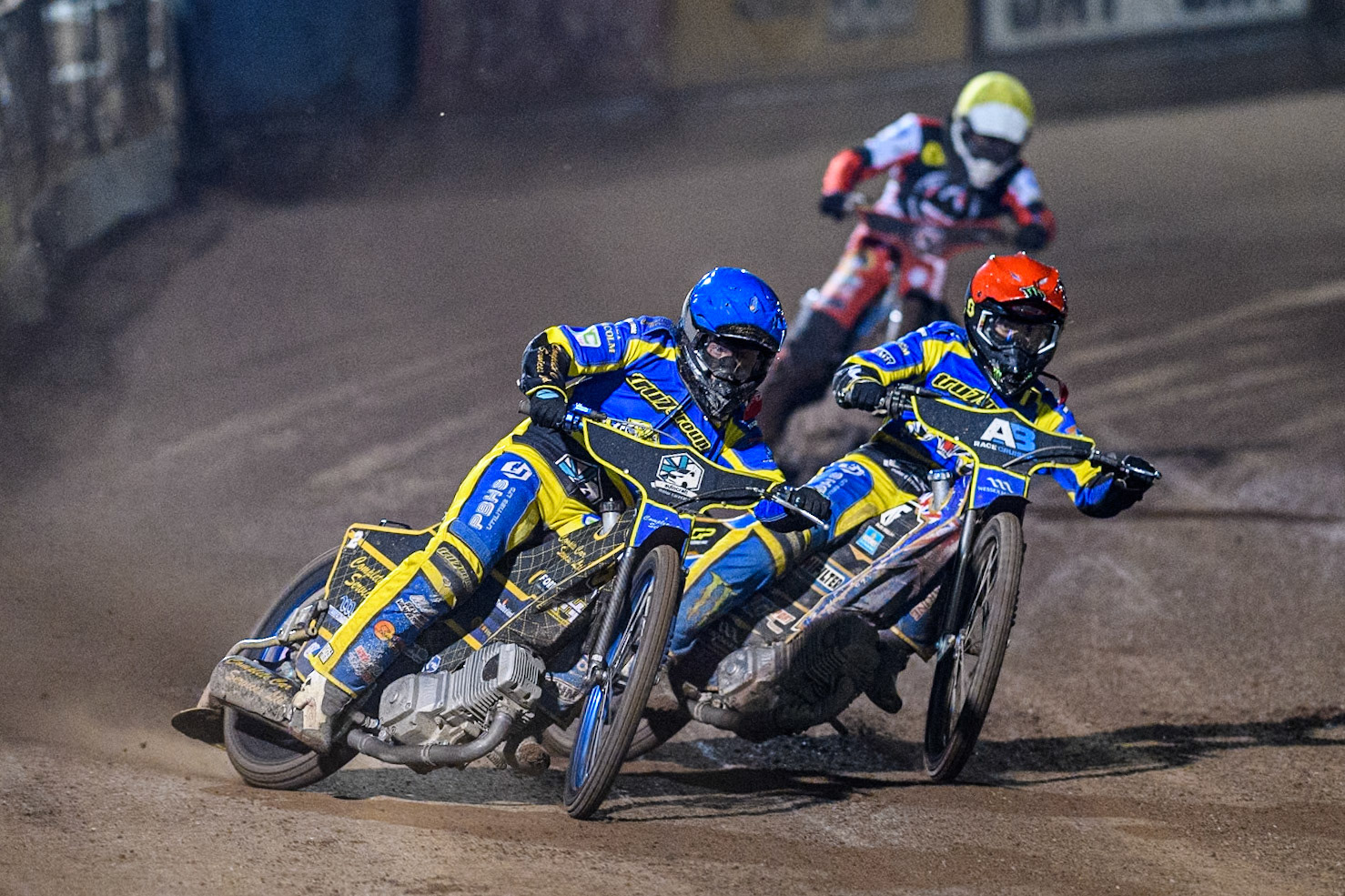 Sheffield Tigers' Kyle Howarth  in Blue and Sheffield Tigers' Jack Holder  in Red leading Belle Vue Aces' Antti Vuolas  in Yellow during the Rowe Motor Oil Premiership Play Off Semi Final 2nd leg between Sheffield Tigers and Belle Vue Aces at Owlerton Stadium, Sheffield on Thursday 19th September 2024. (Photo: Ian Charles | MI News)
