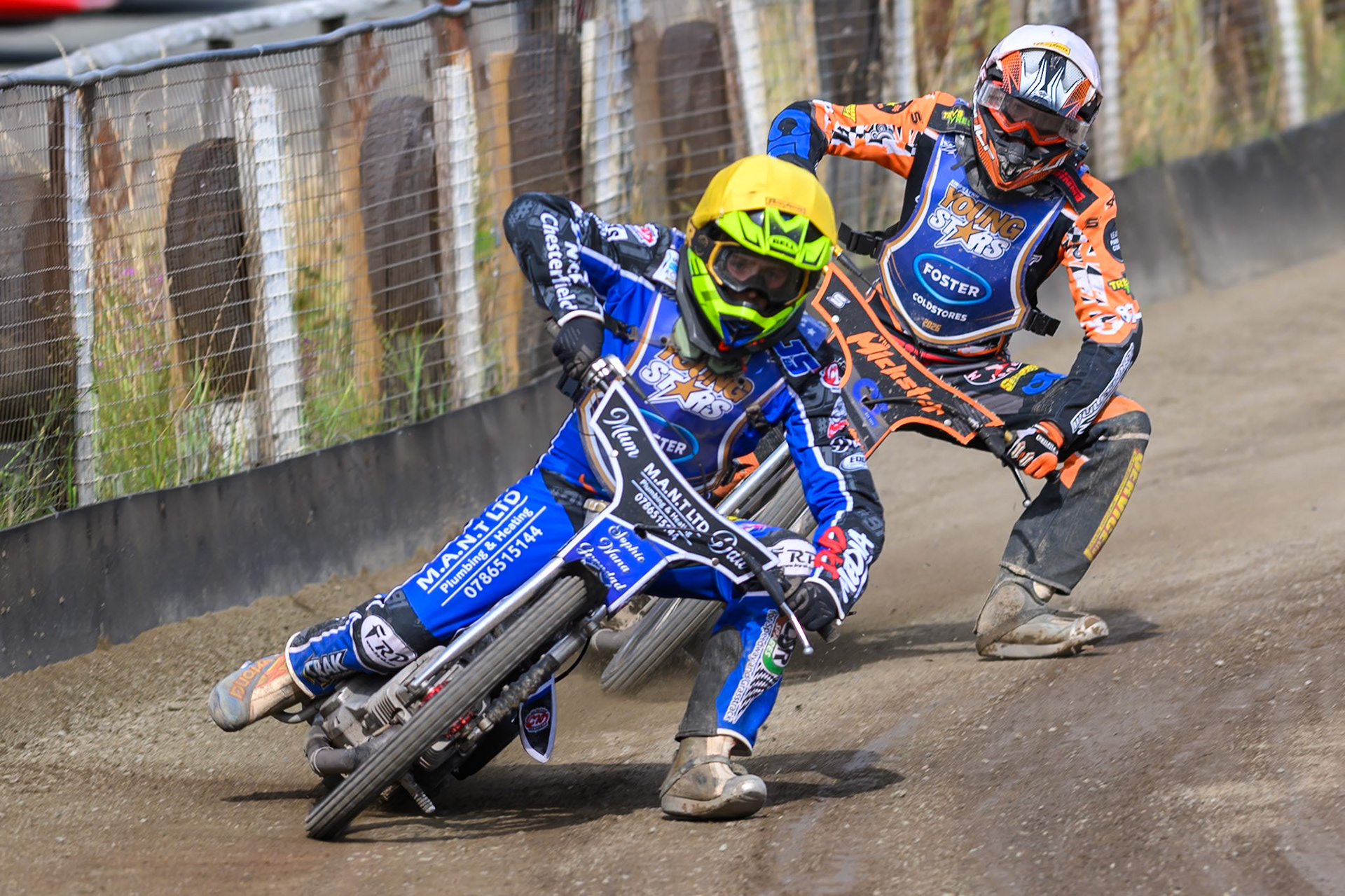Ollie Binns of Kings Lynn Young Stars  in Yellow leading Jack Roberts of Buxton Bulls in White during the WSRA National Development League match between Buxton Bulls and King's Lynn Young Stars at Hi-Edge Speedway, Buxton on Sunday 9th August 2026. (Photo: Ian Charles | MI News)