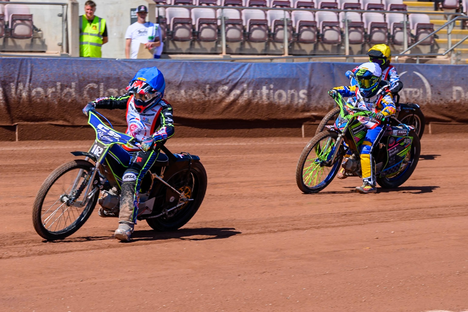 125cc SUPPORT CLASS Cody Smith (162) in Blue leading Ezra McNair (343) in White and Cody Evans (183) in Yellow during the British Youth Championship (125cc) at the National Speedway Stadium, Manchester on Sunday 19th July 2026. (Photo: Ian Charles | MI News)