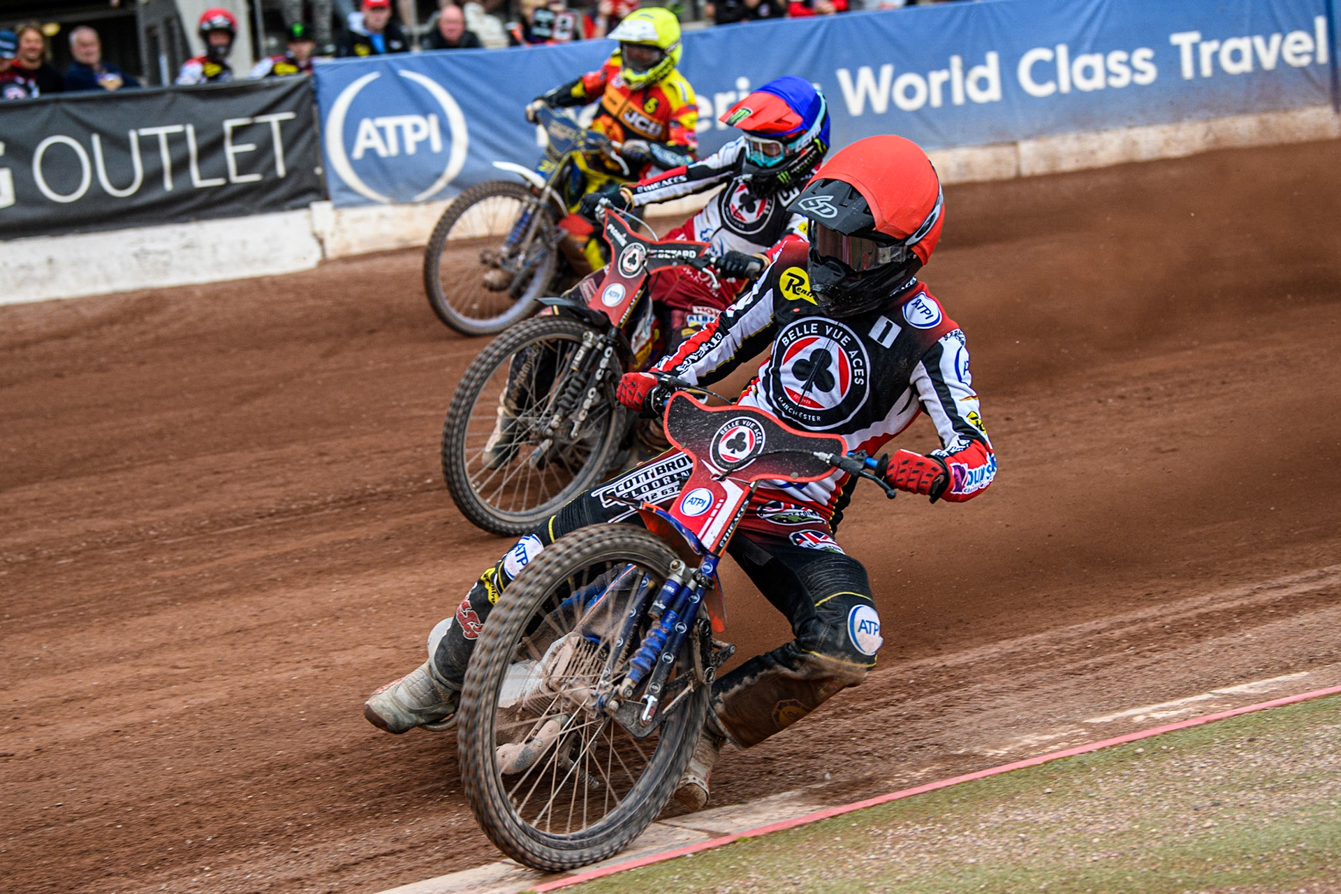 Brady Kurtz (Red) inside team mate Dan Bewley (Blue) and Chris Harris (Yellow) during the Sports Insure Premiership match between Belle Vue Aces and Leicester Lions at the National Speedway Stadium, Manchester on Monday 28th August 2023. (Photo: Ian Charles | MI News)