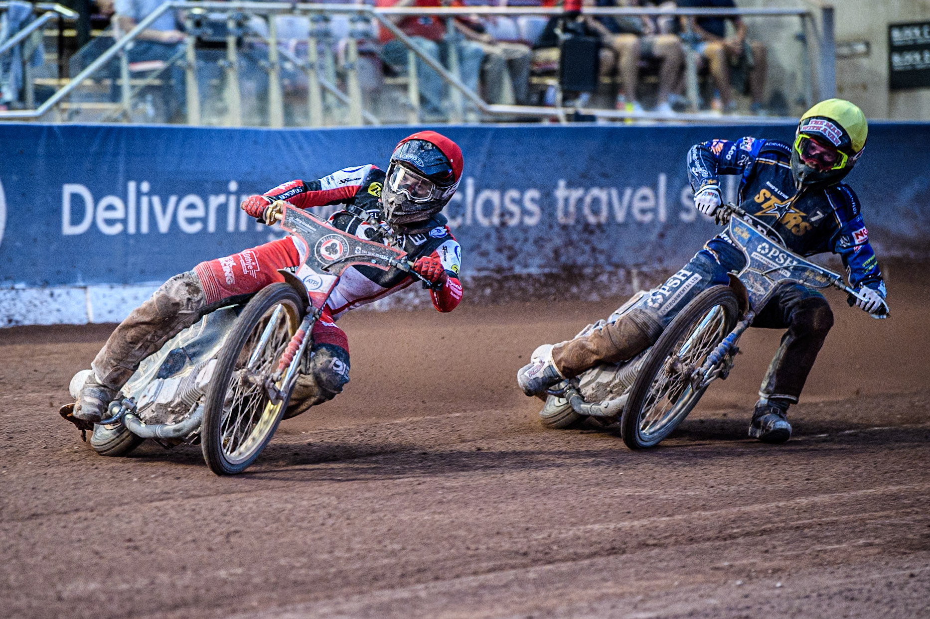 Belle Vue Aces' Norick Blodorn  in Red leading Kings Lynn Stars' Anders Rowe  in Yellow during the Rowe Motor Oil Premiership match between Belle Vue Aces and King's Lynn Stars at the National Speedway Stadium, Manchester on Monday 12th August 2024. (Photo: Ian Charles | MI News)