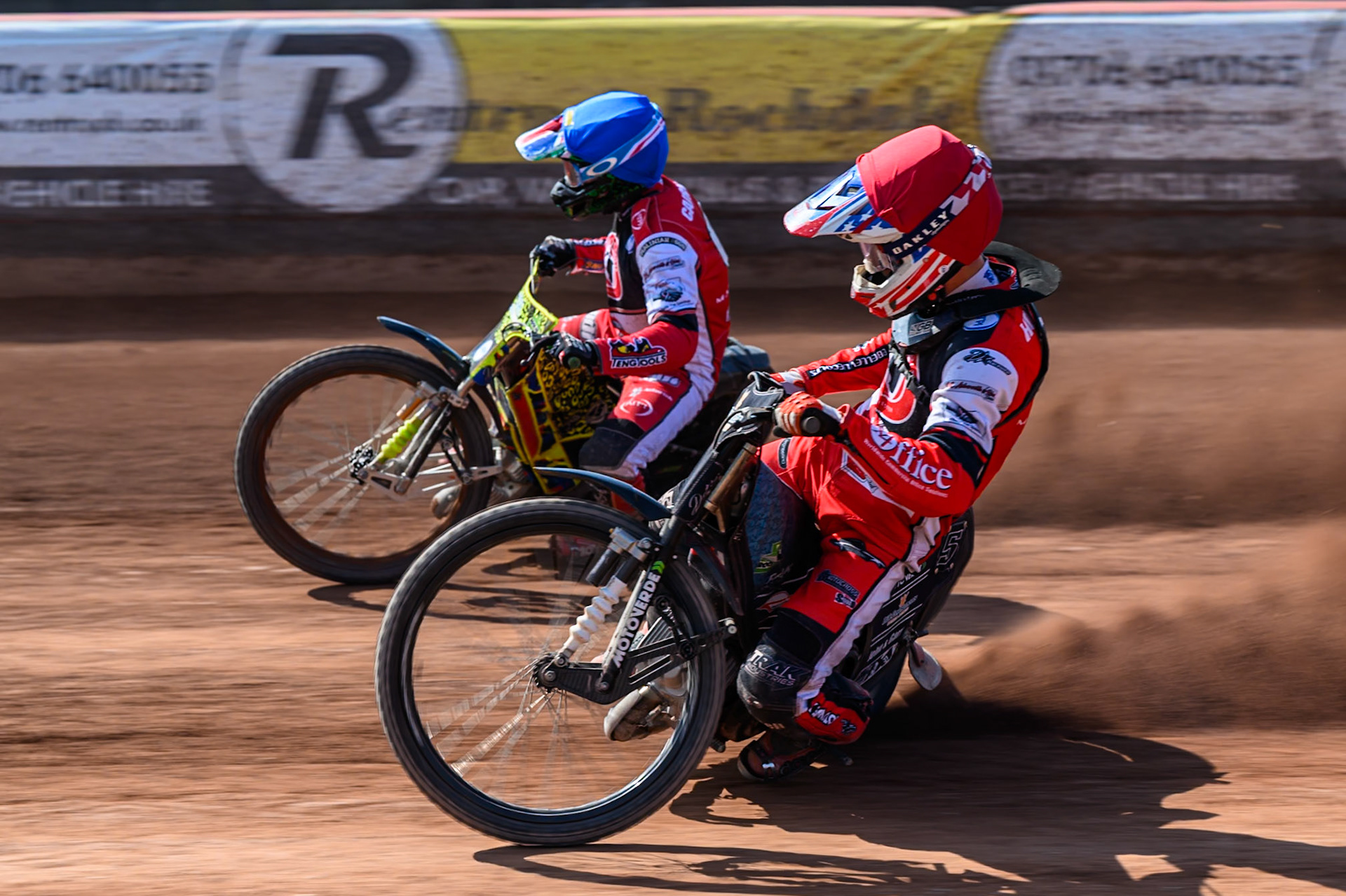 Freddy Hodder of Belle Vue Colts  in Red rides inside William Cairns of Belle Vue Colts   in Blue during the WSRA National Development League match between Belle Vue Colts and Middlesbrough Tigers at the National Speedway Stadium, Manchester on Sunday 10th August 2025. (Photo: Mark Fletcher | MI News)