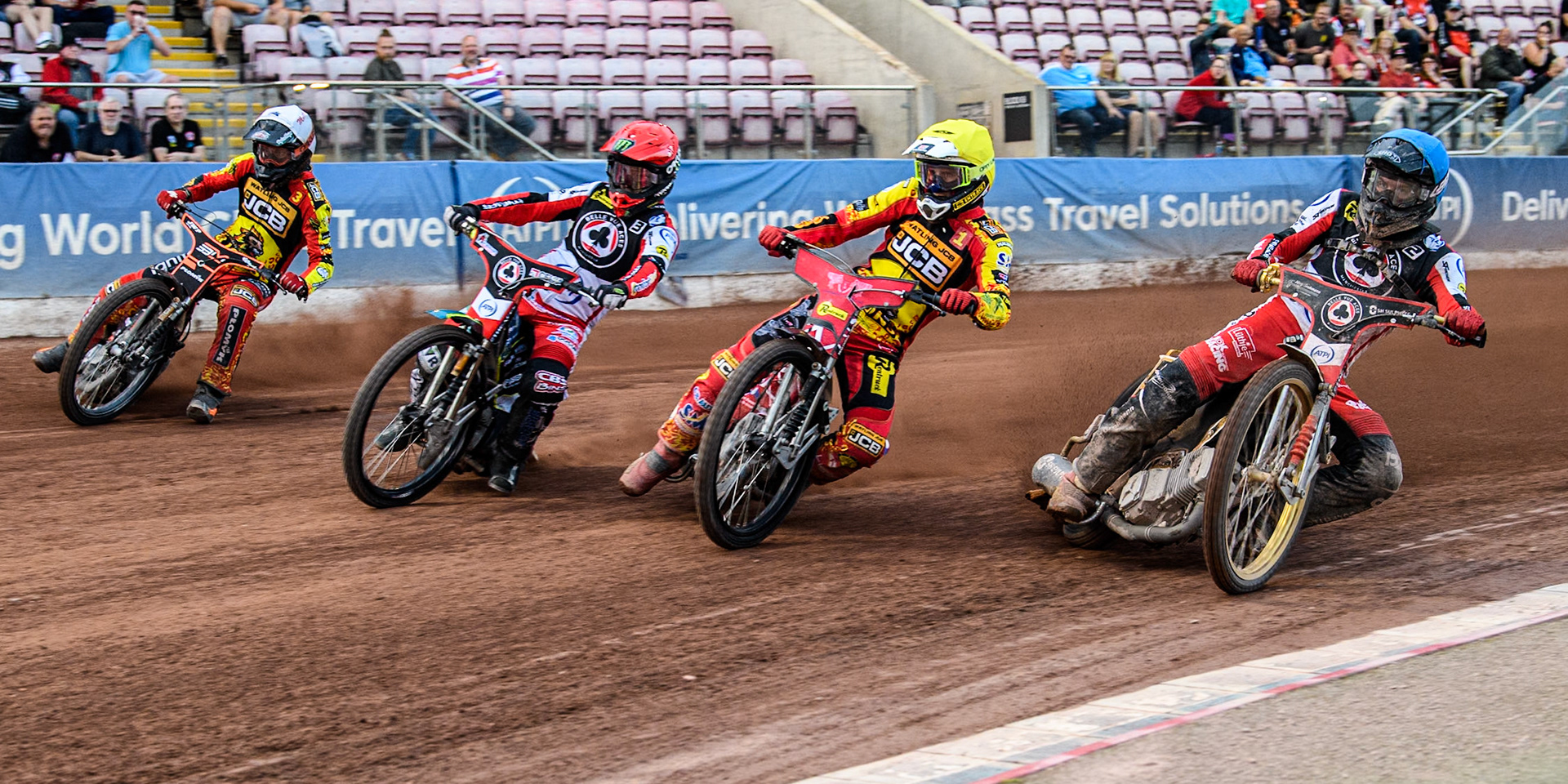 (L to R) Leicester Lions' Sam Masters in White Belle Vue Aces' Jaimon Lidsey in Red, Leicester Lions' Max Fricke in Yellow and Belle Vue Aces' Norick Blodorn in Blue during the Rowe Motor Oil Premiership match between Belle Vue Aces and Leicester Lions at the National Speedway Stadium, Manchester on Monday 24th June 2024. (Photo: Ian Charles | MI News)