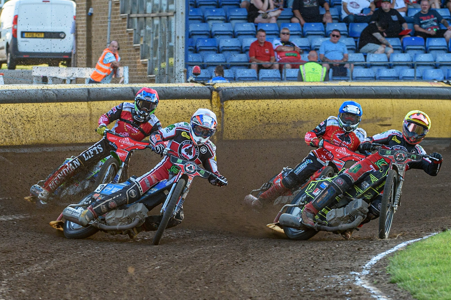 PETERBOROUGH, UK. JULY 19TH Steve Worrall  (White) and Jye Etheridge  (Yellow) lead Hans Andersen  (Red) and Jordan Palin  (Blue)  during the SGB Premiership match between Peterborough and Belle Vue Aces at East of England Showground, Peterborough on Monday 19th July 2021. (Credit: Ian Charles | MI News)