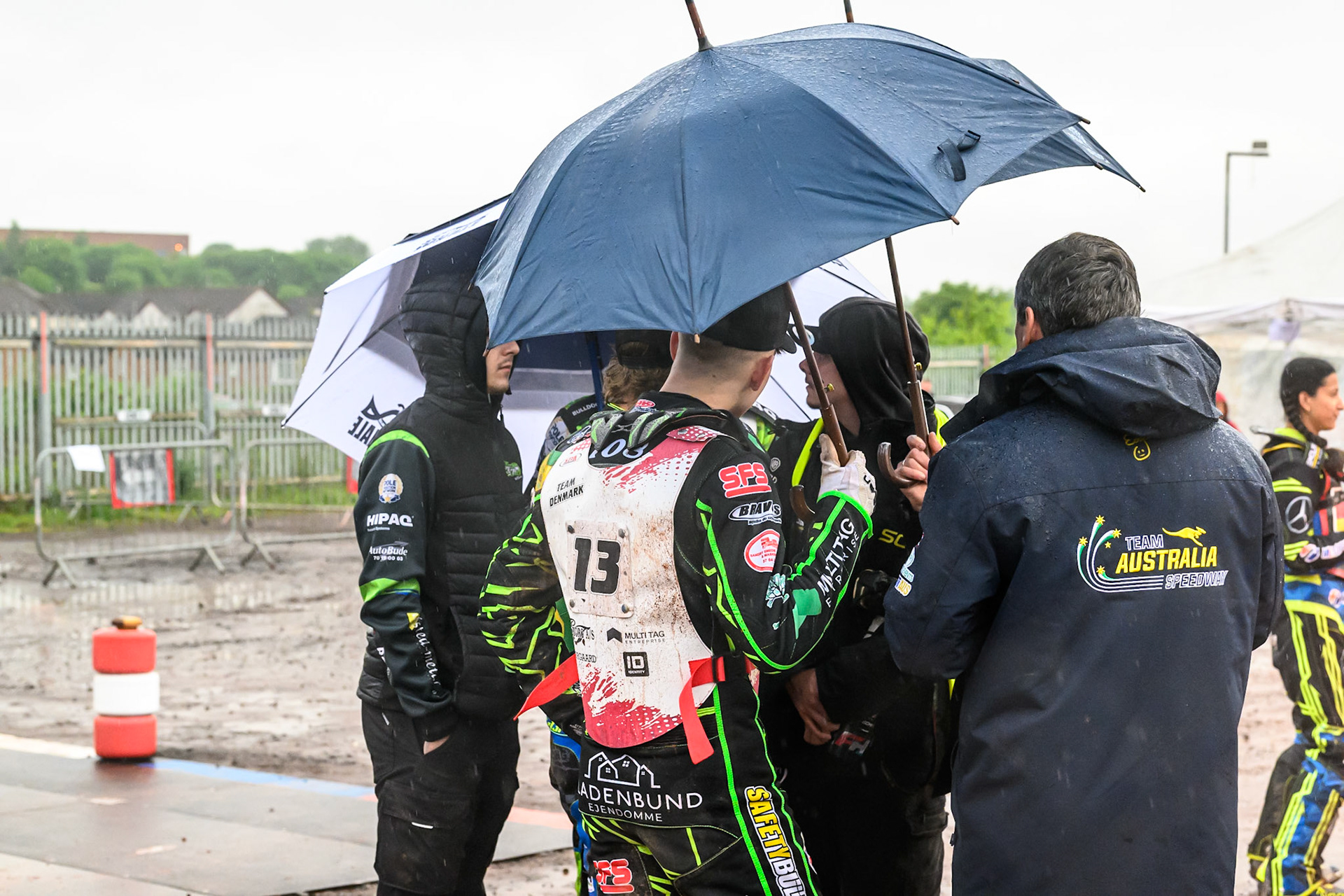 Riders shelter from the rain during the FIM SGP2 Qualifying Round at the Peugeot Ashfield Stadium in Glasgow on Saturday 24th May 2025. (Photo: Ian Charles | MI News)