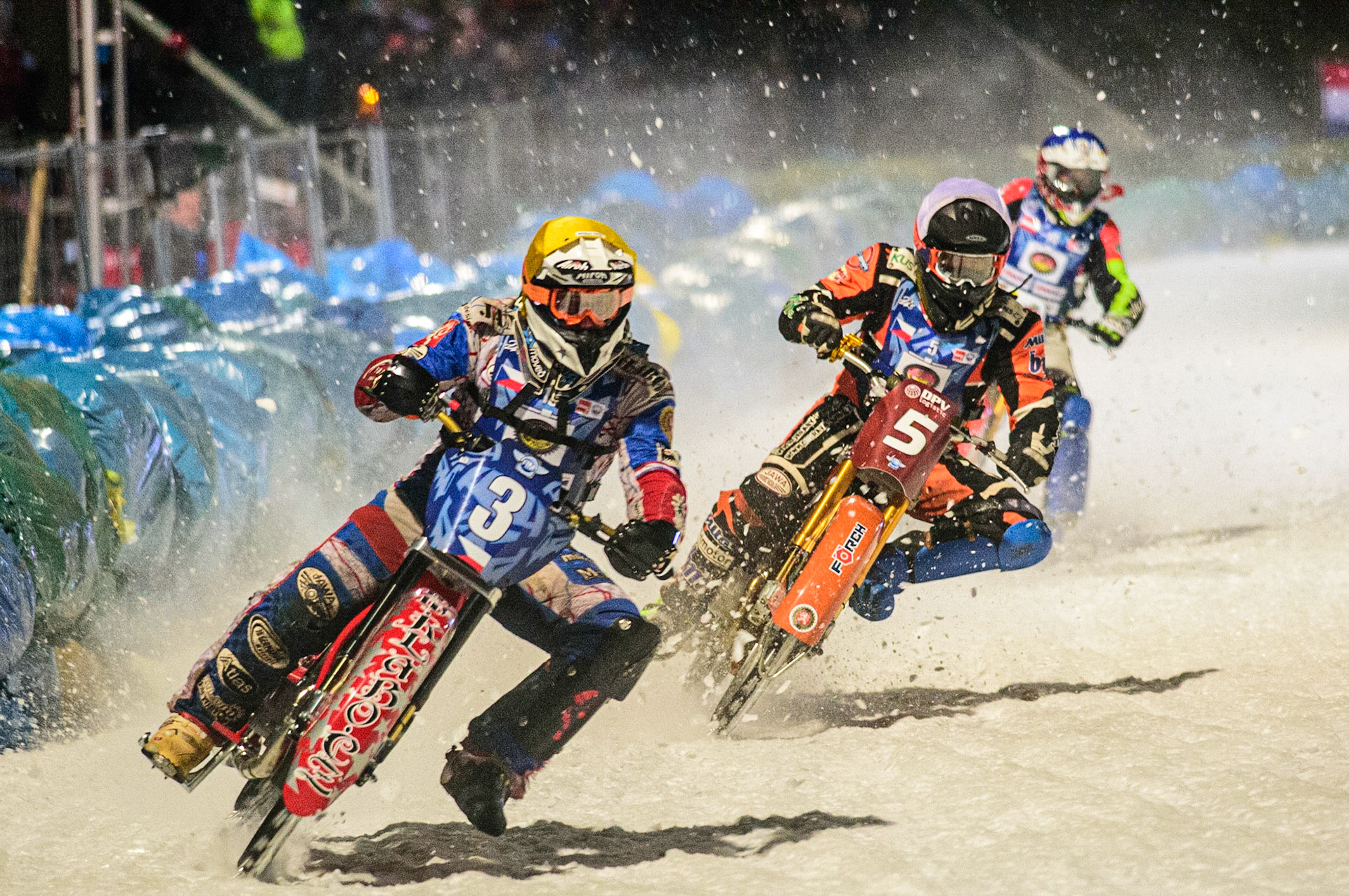 Jan Klatovsky (Yellow) leads Lukas Hutla (White) and Harald Simon (Blue) in the last chance heat during the German Individual Ice Speedway Championship at Horst-Dohm-Eisstadion, Berlin on Friday 3rd March 2023. (Photo: Ian Charles | MI News)