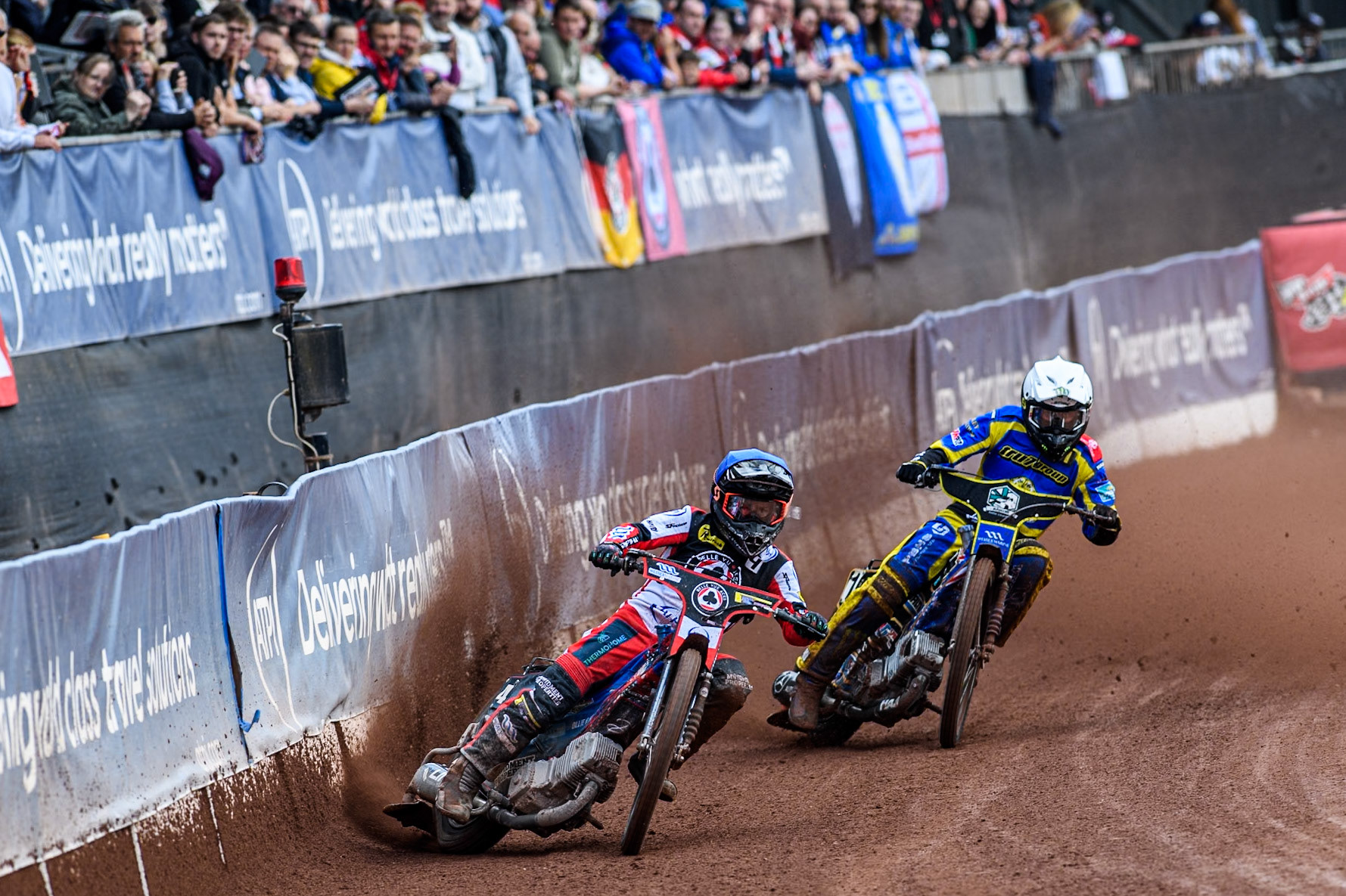Belle Vue Aces' Ben Cook  in Blue leading Sheffield Tigers' Jack Holder  in White during the Rowe Motor Oil Premiership match between Belle Vue Aces and Sheffield Tigers at the National Speedway Stadium, Manchester on Monday 26th August 2024. (Photo: Ian Charles | MI News)