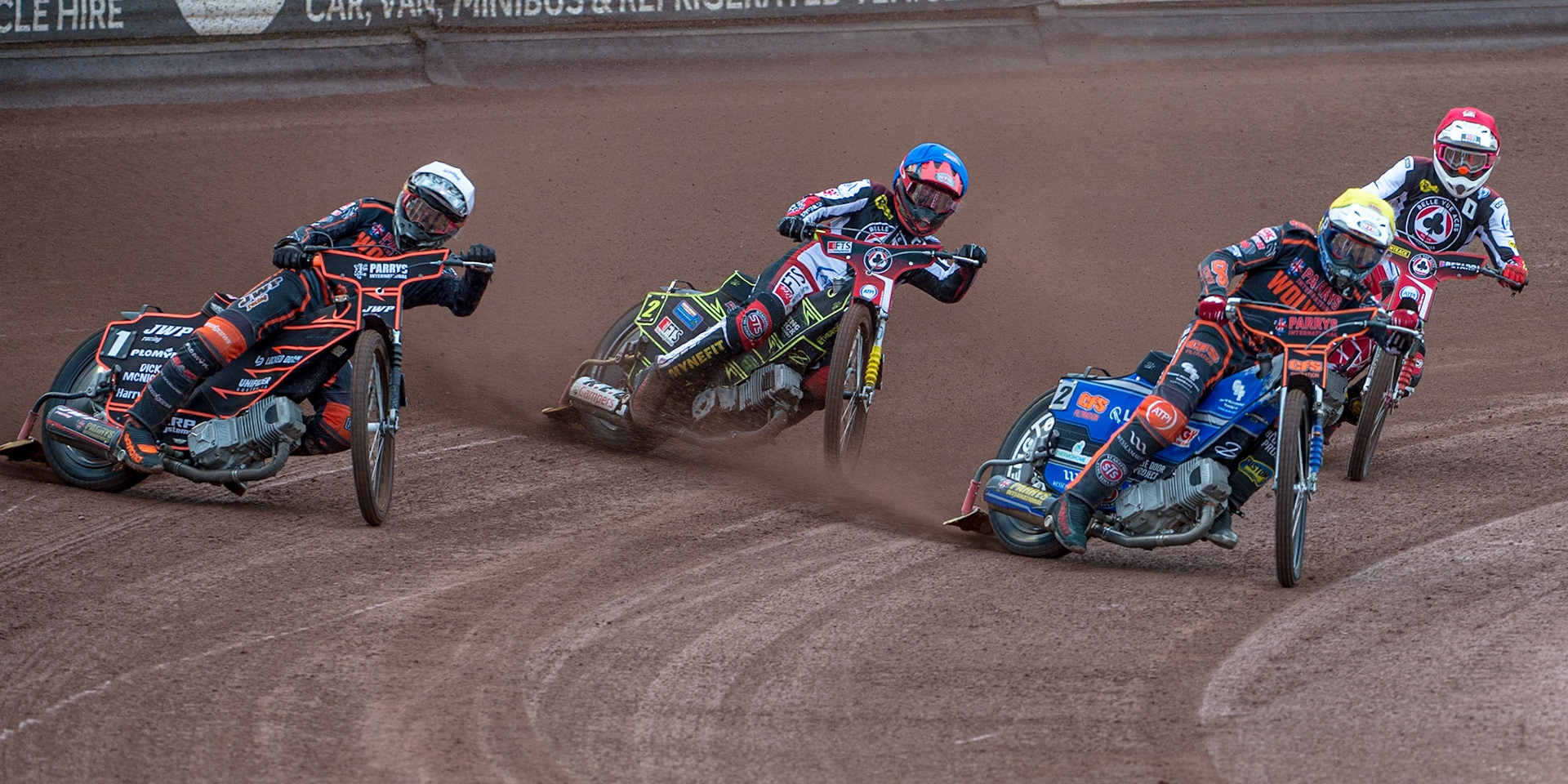 MANCHESTER, UK. JUN 13TH Sam Masters  (White) and Steve Worrall  (Yellow) take a heat winning lead over Jye Etheridge  (Blue) and Max Fricke (Red) during the SGB Premiership match between Belle Vue Aces and Wolverhampton  Wolves at the National Speedway Stadium, Manchester on Monday 13th June 2022. (Credit: Ian Charles | MI News)